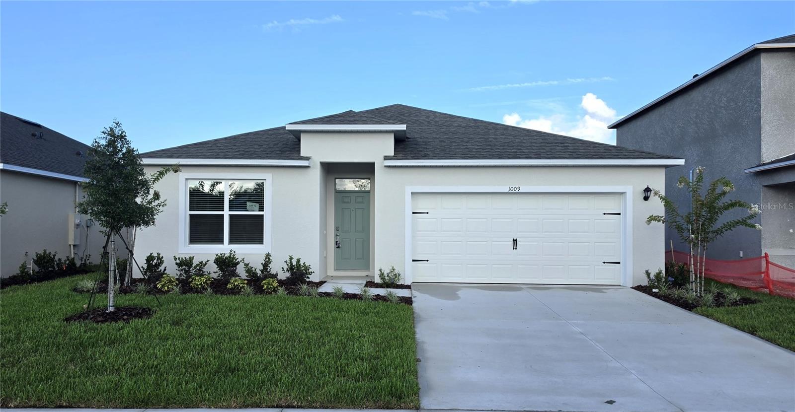 Incredible water front and golf view home. This Brand New one story 4-2 is a very well laid out home with incredible waterfront views of the pond and golf course and distant tree line.  This Cali home from DR Horton has a large main living area with open living room, dining room, and kitchen. The bedrooms are split to provide more privacy. The kitchen has beautiful stone counters that accent the light cabinets and Stainless-steel appliances. A walk-in pantry, island with sink and breakfast bar, and open to the living and dining rooms for central entertaining. The dining room sliding door gives access to the back covered lanai with decent sized back yard and water front with amazing views. The master bathroom has separate toilet room, walk-in shower stall, dual sinks and a side closet next to the main walk-in closet. The laundry room is near the front 3 bedrooms that share the second bath and are all connected by the front hall. Vinyl plank floors through the main living, kitchen, and baths. Carpet in bedrooms. The Cali home includes Smart home technology package which allows you to control your home with your smart device while near or away. Ceiling fans in Living and all bedrooms to be installed this week. Ironwood is a highly desirable community in the famed LGPA International master planned community with tree-lined streets and ponds throughout. Ironwood, built by DR Horton, has an amazing large community pool and covered lanai for family and friend events. This community is nestled on the west side of World Famous Daytona Beach, between the I4 and 95. With winding, tree covered roads and close proximity to schools, tons of new shops and restaurants and the International Daytona Beach Airport and Speedway, make this your home today. Available now. All information is deemed reliable but not guaranteed