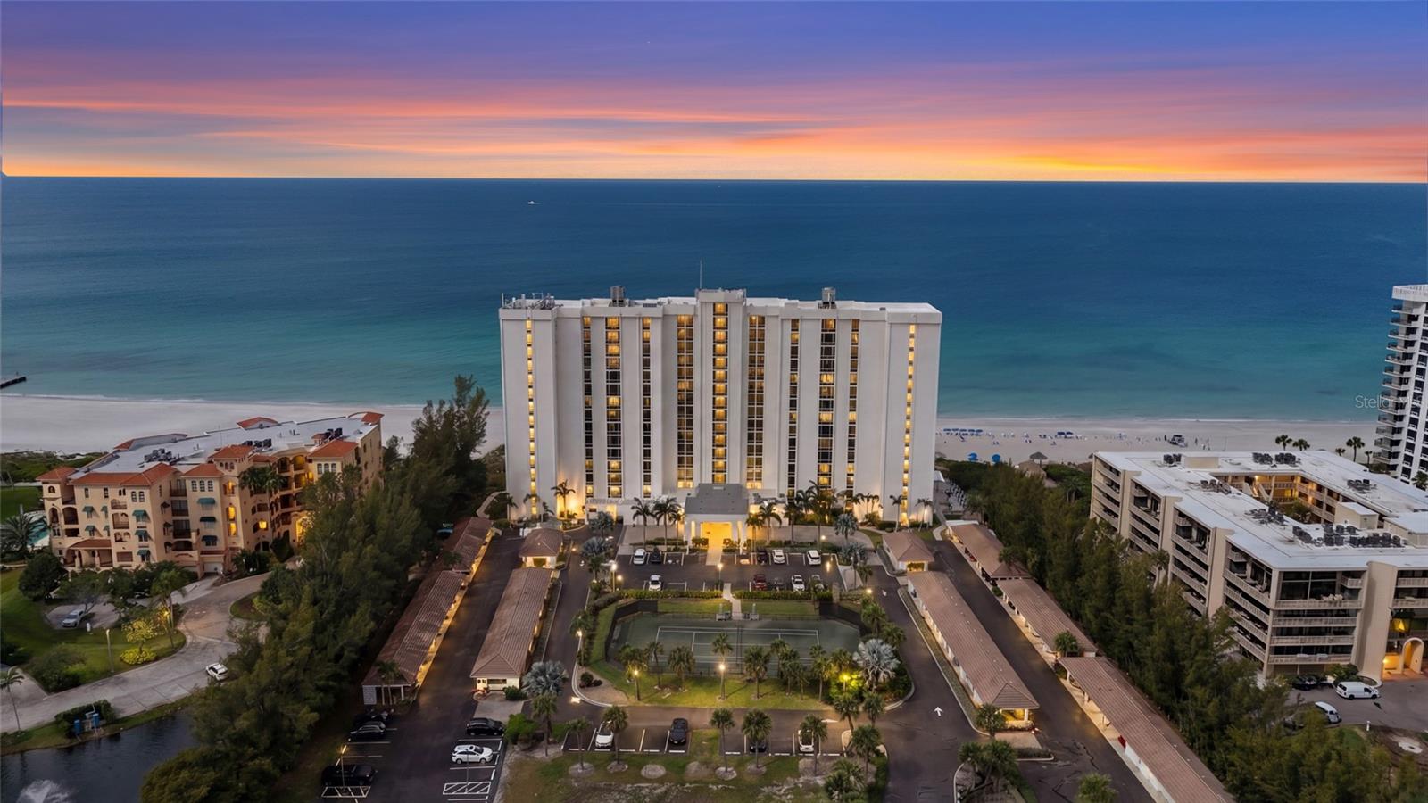 Welcome to the prestigious Sea Gate community on world renowned Longboat Key! With direct views of the Gulf of Mexico from every room and situated perfectly on the 8th floor, this stunning 2-bedroom, 2-bathroom residence offers just under 1500 square feet of refined coastal living on pristine white shores, endless turquoise waters and vibrant sunsets that create a truly extraordinary backdrop that is postcard worthy! This beautifully appointed residence has been meticulously maintained by the owners and showcases expansive glass sliders that flood the home with natural light, seamlessly connecting the indoor living spaces to a private balcony and your front-row seat to one of Florida’s most coveted coastlines.Thoughtfully enhanced for both comfort and style, the residence features fresh interior paint, a new HVAC system and Hot Water Tank and some new kitchen appliances, delivering a modern and move-in-ready experience. The addition of an in-unit washer and dryer provides a rare and highly desirable level of convenience within the building. The spacious layout offers an effortless flow between the living, dining and kitchen areas for both everyday living and entertaining.The primary suite serves as a peaceful retreat, complete with generous proportions, ample storage and a calming ambiance inspired by the surrounding Gulf views, walk- in closet and ensuite. A well-appointed guest bedroom boasts a private balcony and large closet, while the guest bath provides comfort and privacy for visitors. Residents of Sea Gate enjoy an intimate, resort-style lifestyle with direct beach access, a beachfront pool, tennis courts, a fitness center, and beautifully maintained grounds, all within a private, boutique community setting. Additionally, Sea Gate offers covered parking, ample guest parking and a large storage unit! The building has undergone major capital improvements in recent years, including impact-rated windows (2021), a full exterior restucco and repaint (2022), a new roof (2023) and upgrades to the pool, spa, sundeck and elevator doors.  Residents enjoy resort-style amenities including a Gulf front pool and hot tub, fitness center, clay tennis court, library, and a social room with catering kitchen. Shaded tiki huts, outdoor showers, and climate-controlled storage for bikes, kayaks, and paddleboards complete the experience of true beachfront living. All fully paid for by current owners, totaling over $100K/unit. Ideally located near daily shopping, Longboat Key offers a lifestyle defined by elegance and ease, with world-class golf, waterfront dining, boating, and the upscale shops and restaurants of St. Armands Circle just moments away, along with the cultural attractions of Sarasota. With monthly rentals allowed, a unit of this stature could rent for 10k a month in season offering potential income. Option to be sold turnkey furnished as well. Don't hesitate, this unit is a beaut and easy to show!