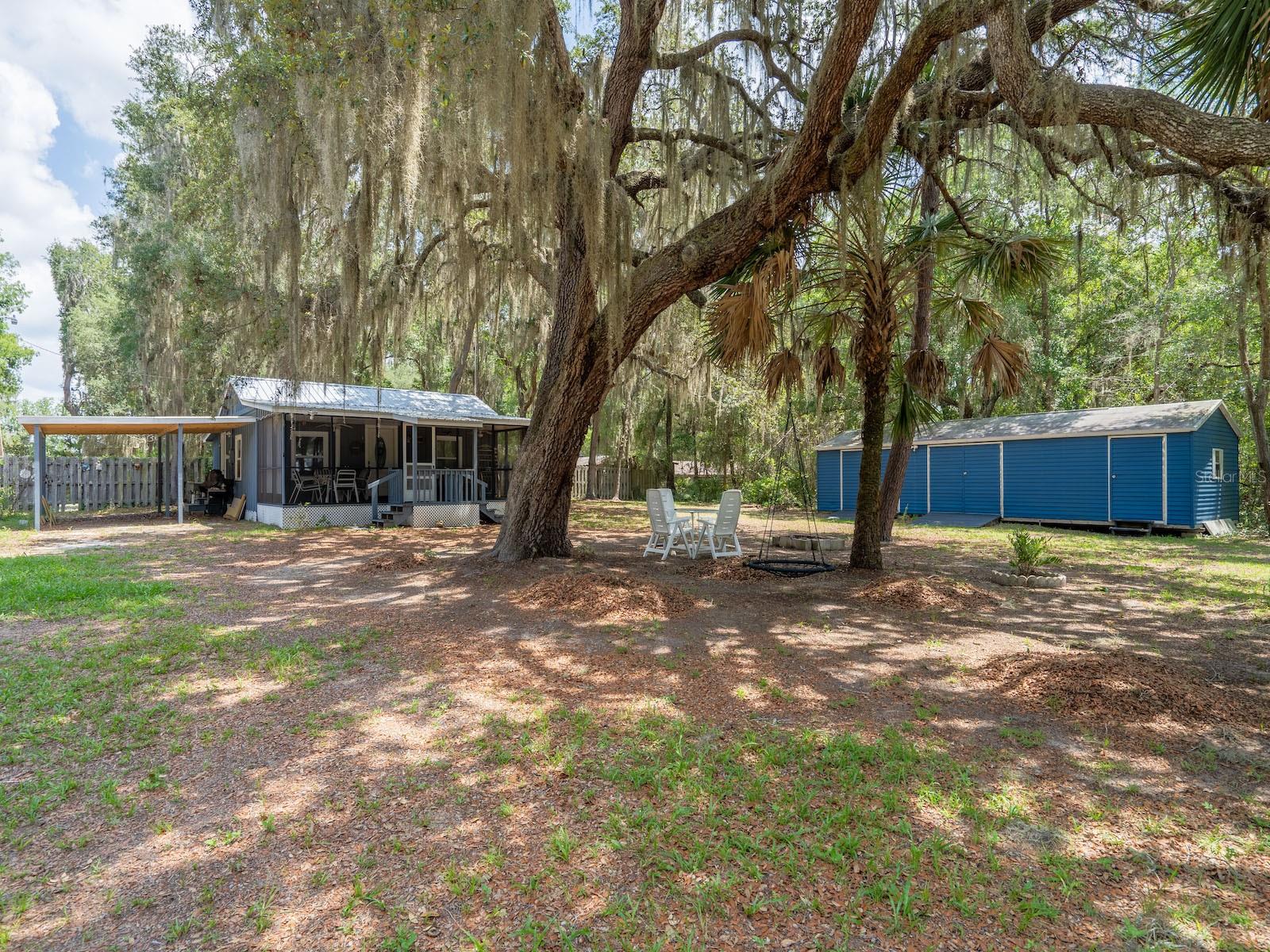 Turn-Key Outdoor Retreat Near Rodman Reservoir & Ocala National Forest

17649 NE 246 Place, Fort McCoy, FL 32134
2 Bedrooms | 1 Bathroom | 689 Sq Ft | Fully Furnished | Move-In Ready

Whether you're searching for the perfect weekend getaway, vacation rental, hunting and fishing camp, or full-time residence, this turn-key, fully furnished home is ready for you to move in and start enjoying the Florida outdoors from day one.

Located in the peaceful Cedar Landing community, this charming home sits just 0.3 mile from public access to the Rodman Reservoir via the Cross Florida Greenway, giving you quick access to one of Florida's premier destinations for bass fishing, boating, kayaking, and wildlife viewing. For outdoor enthusiasts, the Ocala National Forest OHV Trail System is nearby, offering endless miles of trails for side-by-sides, ATVs, Jeeps, dirt bikes, and more.

Originally built in 1963, this site-built home has been thoughtfully renovated while preserving its timeless character. Inside you'll find 2 bedrooms, 1 beautifully remodeled bathroom, and 689 square feet of comfortable living space. The spacious living room showcases stunning tongue-and-groove heart pine walls and ceilings, creating a warm, rustic atmosphere that's difficult to replicate. Original heart pine wood floors remain beneath the carpet, offering an exciting opportunity for future owners.

Over the past few years, the seller has completed numerous improvements, including a new metal roof (2025), updated doors and windows, electrical upgrades including the service panel, outlets, and security lighting, three new mini-split heating and cooling systems, and in 2023 the front screened porch was completely re-screened with new steps and fresh paint.

The kitchen features floor-to-ceiling ceramic tile walls, abundant cabinetry, all appliances included, and a convenient side entrance leading directly to the covered carport.

The beautifully updated bathroom includes a new shower pan, tiled shower surround, floor-to-ceiling ceramic tile, updated vanity, and new flooring, giving it a clean, modern feel.

The primary bedroom is generously sized, while the second bedroom offers comfortable accommodations for family or guests.

Outdoor living is just as inviting with the spacious 10.5' x 26' screened front porch, perfect for enjoying your morning coffee or relaxing after a day on the water or trails. A 16' x 20' covered carport provides protected parking for your vehicle, boat, golf cart, or outdoor toys. Also included, 14'x40' metal storage/workshop with double doors, washer dryer and of course electric and water. 

Located just minutes from the Rodman Reservoir, Ocklawaha River, Cross Florida Greenway, and Ocala National Forest, you'll enjoy some of Florida's finest fishing, boating, hunting, kayaking, hiking, horseback riding, and OHV recreation. Whether you're looking for a weekend retreat, Airbnb opportunity, or full-time residence, this property offers an incredible combination of location, updates, and lifestyle.

Simply bring your clothes, unpack, and start enjoying everything this incredible area has to offer. Schedule your private showing today!