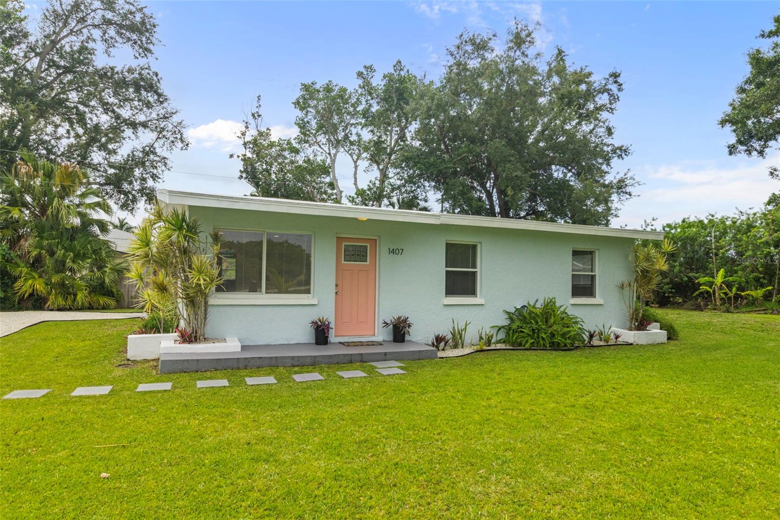 "One or more photo(s) was virtually staged."  Welcome home to this beautifully maintained property where all the hard work has already been done for you, simply move in, unpack, and start enjoying Florida living!  Inside, you’ll find ceramic tile flooring throughout with polymer fortified grout making it moisture and stain resistant and maintenance a breeze. The spacious living room offers plenty of room to gather with family and friends, while the inviting eat-in kitchen provides the perfect space for casual meals and morning coffee. With two full bathrooms, everyone is sure to appreciate the convenience, including a bathroom featuring a relaxing bathtub and shower combination, perfect for soaking or accommodating little ones during bath time.  Enjoy the peace and quiet sipping coffee on your front porch or the screened in back porch for added privacy.  This home also features a Thermoplastic Polyolefin roof which has a reflective membrane surface to minimize UV heat absorption (energy efficient), also engineered to withstand heavy rains and wind giving you piece of mind during hurricane season.  The roof is resistant to algae and cleaning is a breeze using a pressure washer and NO chemicals.  Step outside and discover one of this property’s standout features, an oversized corner lot offering privacy, minimal traffic, and endless opportunities. Whether you need space for your boat, RV, trailers, or outdoor toys, this property has room to spare. The possibilities continue with the large, detached shed, complete with its own dedicated power pole ready for activation. This versatile space could become a workshop, craft studio, hobby room, home gym, storage area, man cave, she shed or even be explored as a future guest or flex space.  The quiet location is ideal for those seeking a peaceful setting while still enjoying easy access to everyday conveniences. You’ll be just minutes from restaurants, shopping, entertainment, and beautiful local beaches, making it easy to enjoy everything the area has.  Whether you’re searching for a move-in-ready home, seasonal getaway, an income-producing rental opportunity, or a property with extra space for your hobbies, storage, or future expansion, this exceptional property offers the perfect blend of comfort, versatility, and endless potential.  For added piece of mind, the seller is offering up to $1,000 toward a home warranty of the buyer's choosing with an acceptable contract.