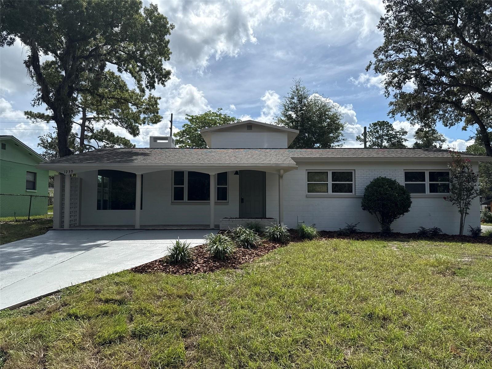 Welcome home to this beautifully updated 3-bedroom, 3-bathroom residence in the desirable Lincoln Estates neighborhood, offering the perfect blend of space, comfort, and modern upgrades. Featuring a dedicated den/office and two separate living areas, this home provides plenty of flexibility for working from home, entertaining, or creating the perfect family retreat. Step outside to enjoy your own private balcony overlooking the backyard, complete with a cozy fire pit, storage shed, and plenty of room to relax or entertain on the corner lot. Major updates provide peace of mind, including a brand-new roof, new HVAC system, new hot water heater, and new energy-efficient windows. Conveniently located just minutes from downtown Gainesville, you'll enjoy easy access to restaurants, shopping, entertainment, parks, and the University of Florida while still having the privacy and charm of an established neighborhood.