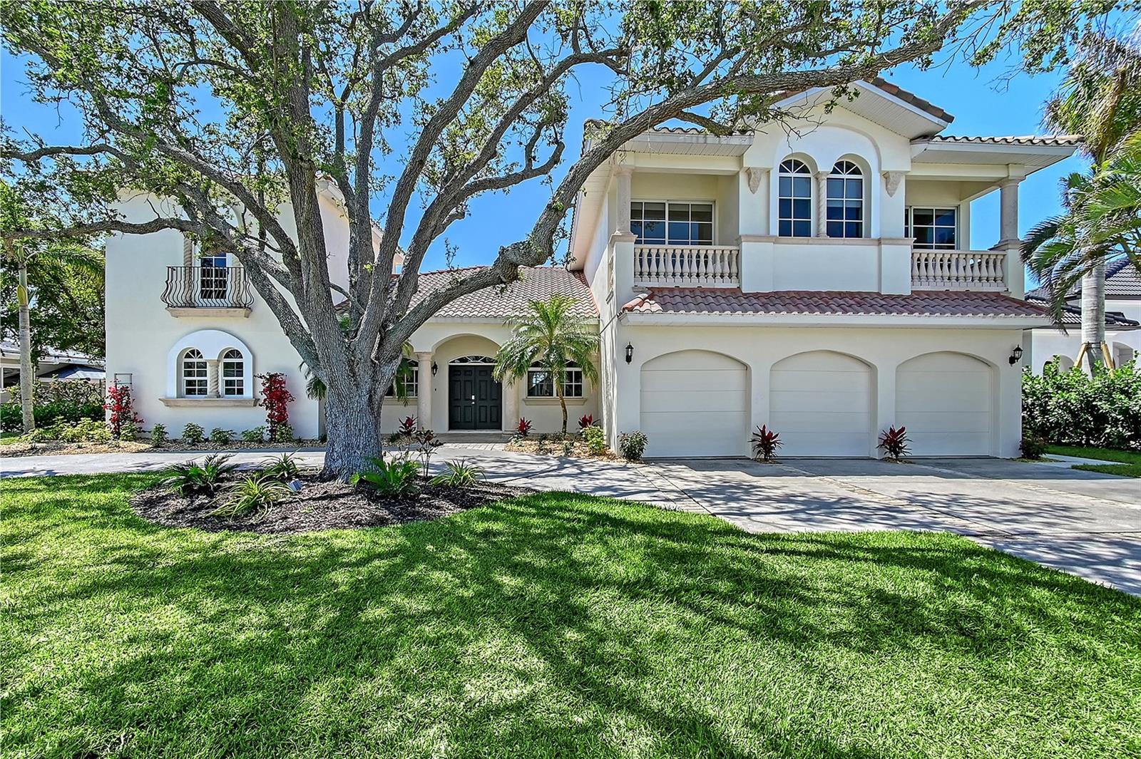 Waterfront Living Reimagined.
Welcome to your modern sanctuary in eclectic Sapphire Shores — a rare blend of luxury, lifestyle, and location. This newly remodeled 5-bedroom, 6.5-bathroom estate offers 150 feet of direct Sarasota Bay frontage, complete with a private beach lounge and launch for paddleboards, kayaks and jet skis.
Wake up to panoramic views of the Sarasota skyline, Ringling Bridge, and Longboat Key, and wind down with unforgettable sunsets from your expansive balcony or poolside lounge areas — all in a home recently chosen as the exclusive backdrop for an international bridal shoot.
Inside, discover 5,270 square feet of elevated design — from soaring 19-foot ceilings and walls of glass to an amazing open chef’s kitchen with custom gloss cabinetry, Cambria quartz island, built-in wine bar, and premium stainless appliances.
With two luxe primary suites featuring a one-off Zen bathroom, a flexible study/library, and multiple guest suites with ensuite offices, this home is built for multi-generational living, remote work, and creative pursuits. A potential sixth bedroom offers space for a media room, playroom, or wellness studio.
Impact-rated windows and doors ensure peace of mind, while lush landscaping and a new seawall create a private, secure waterfront retreat.
Whether you're hosting sunset soirées or enjoying quiet family nights by the bay, this home is designed for connection, comfort, and unforgettable moments.
Located in Sarasota’s walkable and vibrant Museum Area, you're steps from the Ringling Museum, Asolo Theatre, New College, and minutes from downtown amenities, St. Armand’s Circle, Lido Beach, and IMG Academy.
Live where culture meets coastline — and every day feels like a vacation.  LIVE VIDEO IN TOUR LINK 1.