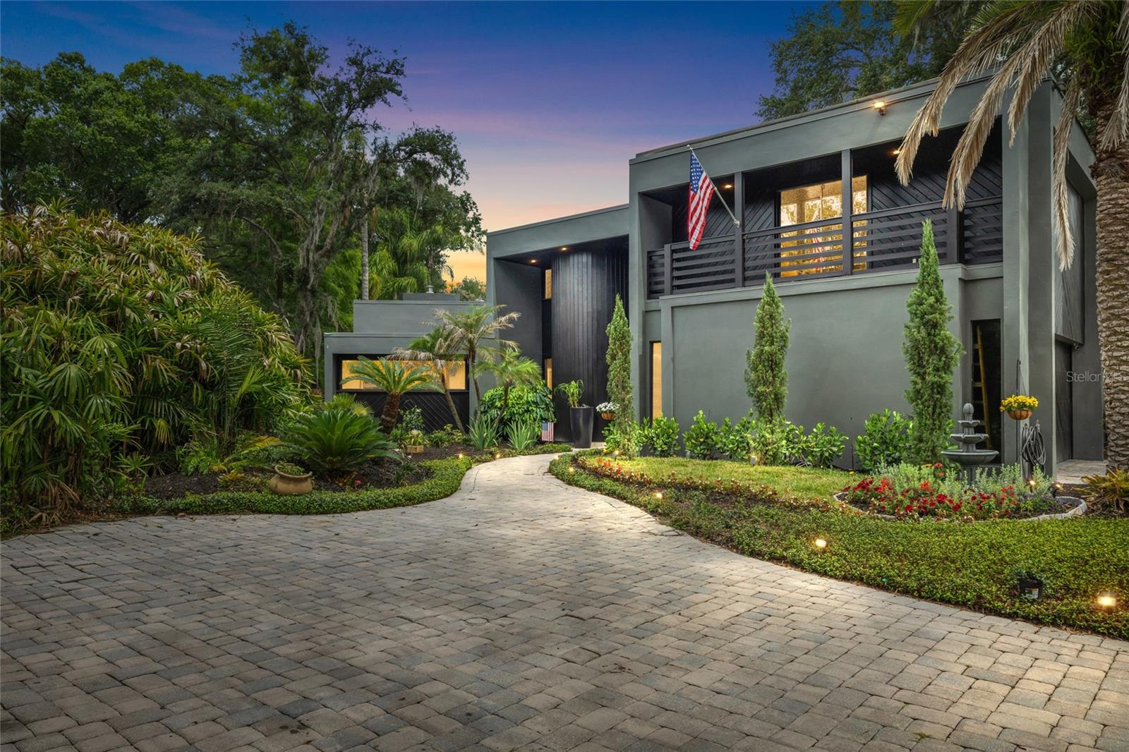 Welcome to 410 Montrose Avenue, a truly exceptional custom-built estate perfectly positioned on the 16th hole of the historic Temple Terrace Golf Course. This impressive pool home offers 5 bedrooms, 3.5 bathrooms, a spacious two-car garage, and over 4,100 square feet of beautifully designed living space, blending timeless elegance with modern comfort in Temple Terrace's most sought-after neighborhood. From the moment you arrive, you'll be captivated by the home's striking modern elevation, stately curb appeal, lush mature landscaping, and brick-paver driveway leading to the oversized side-entry garage. Situated on a generous 0.36-acre homesite, the property enjoys picturesque golf course views while maintaining privacy through thoughtful landscaping and outdoor design. Inside, soaring ceilings, abundant natural light, and expansive living spaces create an inviting atmosphere ideal for both everyday living and entertaining. The chef's kitchen features extensive counter space, custom cabinetry, a gas range, high-end appliances, and ample prep space, seamlessly flowing into the home's spacious gathering areas. The backyard serves as a private Florida retreat, complete with a stunning pebble-finish saltwater pool, brick-paver deck, outdoor kitchen, and multiple seating areas overlooking the golf course, creating the perfect setting for relaxing or hosting guests. Designed with both functionality and flexibility in mind, the home offers generous living areas and versatile spaces ideal for working from home, accommodating guests, or multigenerational living. Recent improvements include new plumbing in 2025, a roof reseal in 2025, a water heater approximately four years old. Located within the highly desirable Temple Terrace Estates community with no HOA, this home offers convenient access to I-275, I-75, Downtown Tampa, the University of South Florida, Busch Gardens, premier medical facilities, shopping, dining, and more. **Buyer Bonus: Our preferred lender is offering a 1% lender credit of the loan amount, up to $5,000, toward buyer pre-paids and closing costs. Don't miss this rare opportunity to own a distinguished golf course estate in one of Tampa Bay's most charming and established communities. Schedule your private showing today and experience the lifestyle that 410 Montrose Avenue has to offer.