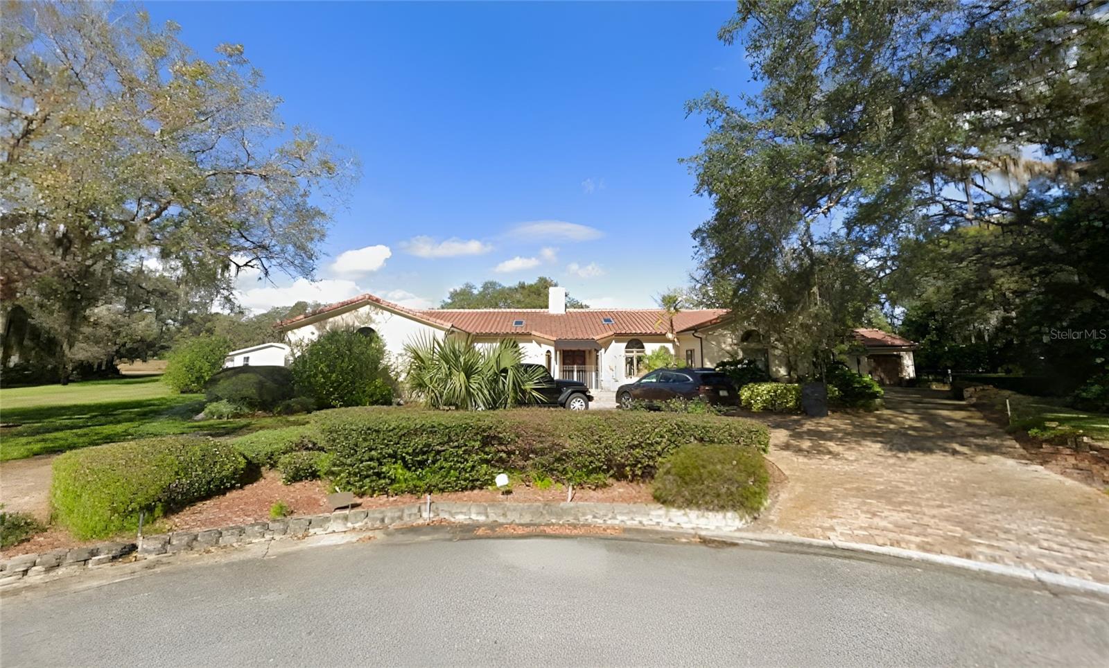 Incredibly rare 4,200+ sqft pool home on the largest lot in the neighborhood, located in a desirable golf community within Grenelefe / Arrowhead Lakes. The owner's surprise relocation gives you the unique chance to secure this gorgeous, well-updated, and spacious residence situated on a sprawling .89-acre double lot at the lowest price per sq ft in the area. Light TLC may be desired, but absolutely no major issues. So what makes this one so special? 1) Massive 4,200+ sqft floorplan offering an incredible amount of living space for large families, entertaining, and work-from-home flexibility. 3 Bedrooms and 4 Full Bathrooms. 2) Huge .89-acre double lot, the largest lot in the neighborhood, providing exceptional privacy, space, and future possibilities. 3) Brand new roof installed in 2020. 4) Large screen-enclosed heated pool, perfect for year-round enjoyment and entertaining guests. 5) Whole-house generator installed in 2018. 6) Huge eat-in kitchen featuring two islands, granite countertops, and gleaming stainless steel appliances including a built-in wall oven, microwave, cooktop, range hood, and hanging pot rack. 7) Exceptional primary suite retreat featuring three walk-in closets, a private water closet, dual-sink vanity, large double walk-in shower, newly installed walk-in soaking tub, and ample space to unwind in comfort. 8) Large detached 20' x 36' shed with electric built in 2023, perfect for hobbies, workshop space, equipment storage, toys, or home business use. 9) Irrigation well helping maintain the property's lush landscaping while reducing watering costs. 10) Well located in a highly desirable and established golf community with a peaceful residential atmosphere and easy access to major roadways leading to Orlando or Tampa. Properties offering this level of space, lot size, upgrades, and value are exceptionally rare. Being sold alongside vacant .68 acre lot next door (ask for other listing): Live in this one and build on the other! Whether you're looking for a primary residence, multi-generational home, or simply room to spread out and enjoy the Florida lifestyle, this property delivers unmatched space and long-term upside. Easy to show. Feel free to soft pitch before writing anything up. MLS info sheet and disclosures available. No assignable contracts accepted.