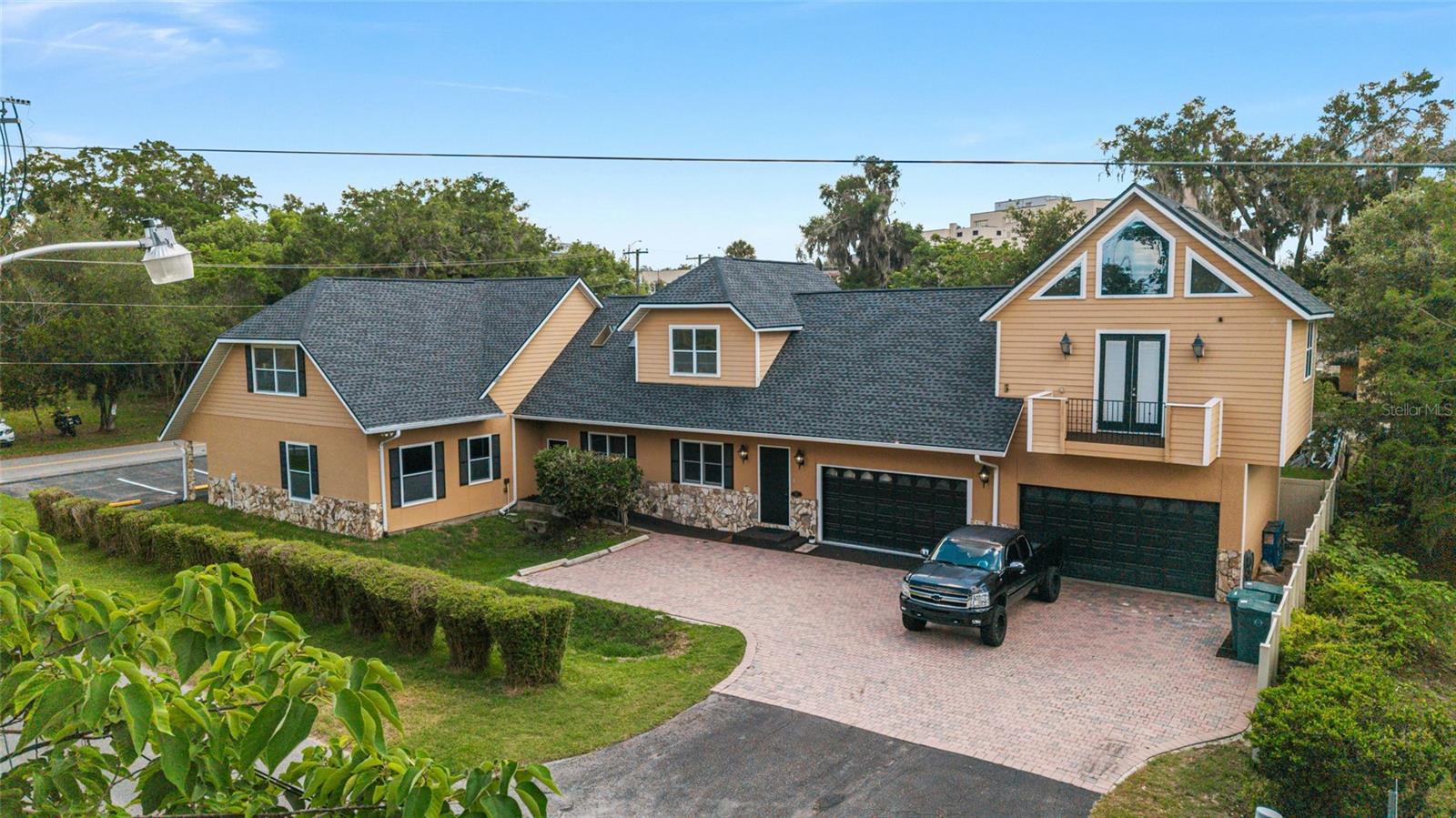 One of Ocala’s premier luxury live/work properties in the heart of the city’s professional corridor. This distinctive mixed-use estate seamlessly combines executive office space with an exceptional private residence, offering an unmatched lifestyle for physicians, attorneys, entrepreneurs, and business owners seeking prestige, convenience, and flexibility.

    The ground level features expansive professional office space ideal for medical, legal, financial, consulting, wellness, or boutique business operations. With a refined layout, multiple private offices, conference area, reception space, and exceptional visibility, the property is perfectly suited for an owner-user or investor seeking a high-end mixed-use asset.

    Above, the luxurious private residence delivers 5 bedrooms for refined living with upscale finishes, entertaining spaces, and elevated comfort rarely found in commercial-integrated properties. Designed for executives who value both efficiency and lifestyle, the residence provides the ultimate blend of privacy and accessibility. 

    Positioned minutes from downtown Ocala, hospitals, government offices, and major business centers, this property offers exceptional accessibility while maintaining a distinguished residential atmosphere.

    Property Highlights:
    • Mixed-use B1A zoning
    • Executive office space on main level
    • Luxury private residence upstairs
    • Approx. 6,776 SF total
    • Ideal for medical, massage/spa, legal, financial, or professional services
    • Live/work flexibility
    • Prime central Ocala location
    • Excellent owner-user or investment opportunity
    • Rare and highly versatile asset class

    This is more than a property — it is a statement headquarters and luxury residence combined into one exceptional offering.

An additional vacant lot which can be used for additional parking is available for an additional amount which is located directly across the street from this lovely office building.
All information is thought to be correct, but buyer and buyer's agent to confirm all details.