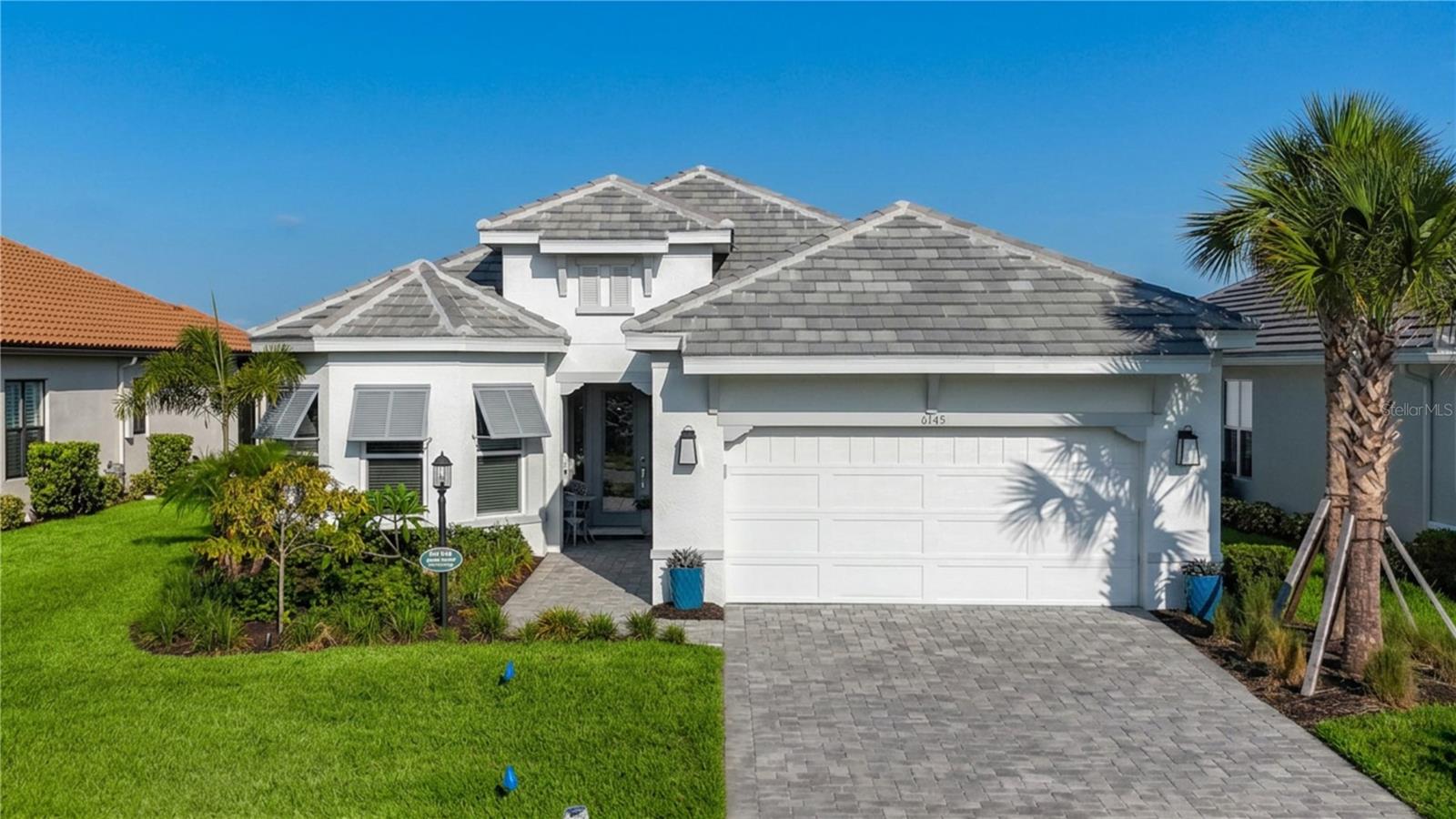 Discover this exceptional home in the highly desirable, gated Esplanade at the Heights community in Bradenton.

Built in 2024, this 3-bedroom, 3-bath residence also includes a versatile den that can function as a home office, fitness room, or guest space, plus an air-conditioned 2.5-car garage with a beautiful epoxy floor.

With over $200,000 in upgrades, the home features a thoughtfully designed open floor plan that creates a seamless flow between the main living areas.


The gourmet kitchen is a chef’s dream, offering top-of-the-line appliances, solid surface counters, solid wood cabinets, and an expansive island ideal for cooking and entertaining.


A spacious, screened lanai extends your living space outdoors and is perfect for morning coffee overlooking the picturesque lake or relaxing evening gatherings.


The fenced backyard provides a safe area for pets and play, while electric hurricane shutters across the rear of the lanai add protection and peace of mind.


Esplanade at the Heights is a premier, master-planned community known for its luxurious and active lifestyle amenities.


The clubhouse serves as the social hub and offers ping pong, billiards, a coffee bar, a top-of-the-line fitness center, and a full-service spa.


Outdoor amenities include tennis courts, pickleball, bocce ball, walking trails, a dog park, playground, and beautifully maintained parks and sidewalks.


The resort-style pool area, complete with cabanas, hot tub, grills, and a fire pit, creates a vacation-like atmosphere right at home.


A unique highlight of the community is Mount Tumalo, the only hill in Bradenton, which offers breathtaking views of Bradenton and Sarasota, along with additional walking trails, fitness areas, and a dog park.


These private amenities, including access to Mount Tumalo, are reserved exclusively for residents, enhancing the sense of community, security, and privacy.


This property is more than just a beautiful home; it is a gateway to a vibrant, amenity-rich lifestyle surrounded by natural beauty and an active social scene.


Whether you prefer a peaceful retreat or a full calendar of activities, Esplanade at the Heights offers something for everyone.


Schedule your showing today and experience this exquisite home and community for yourself.
