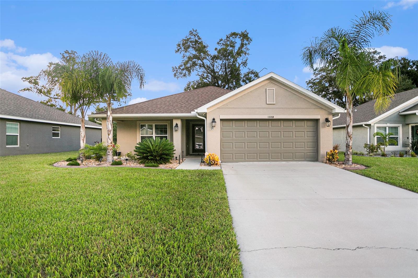 This charming single family home offers a comfortable living space with 3 bedrooms and 2 bathrooms. The open floor plan creates a spacious atmosphere, allowing for a seamless flow between the living, dining, and kitchen areas. Enjoy the beautiful views from the back screened-in patio, a perfect spot for relaxation. The backyard is fully fenced in, providing a private and secure space for outdoor activities or for your furry friends to roam freely. Located on a golf course, this property offers breathtaking views of the greenery. Additionally, residents have access to a community pool, clubhouse, fitness center, and tennis courts, perfect for staying active and socializing. With its desirable location, open floor plan, and outdoor amenities, this home is an ideal choice for families or individuals seeking a comfortable and convenient living space. Don't miss out on the opportunity to make this beautiful property your own. Schedule a showing today!