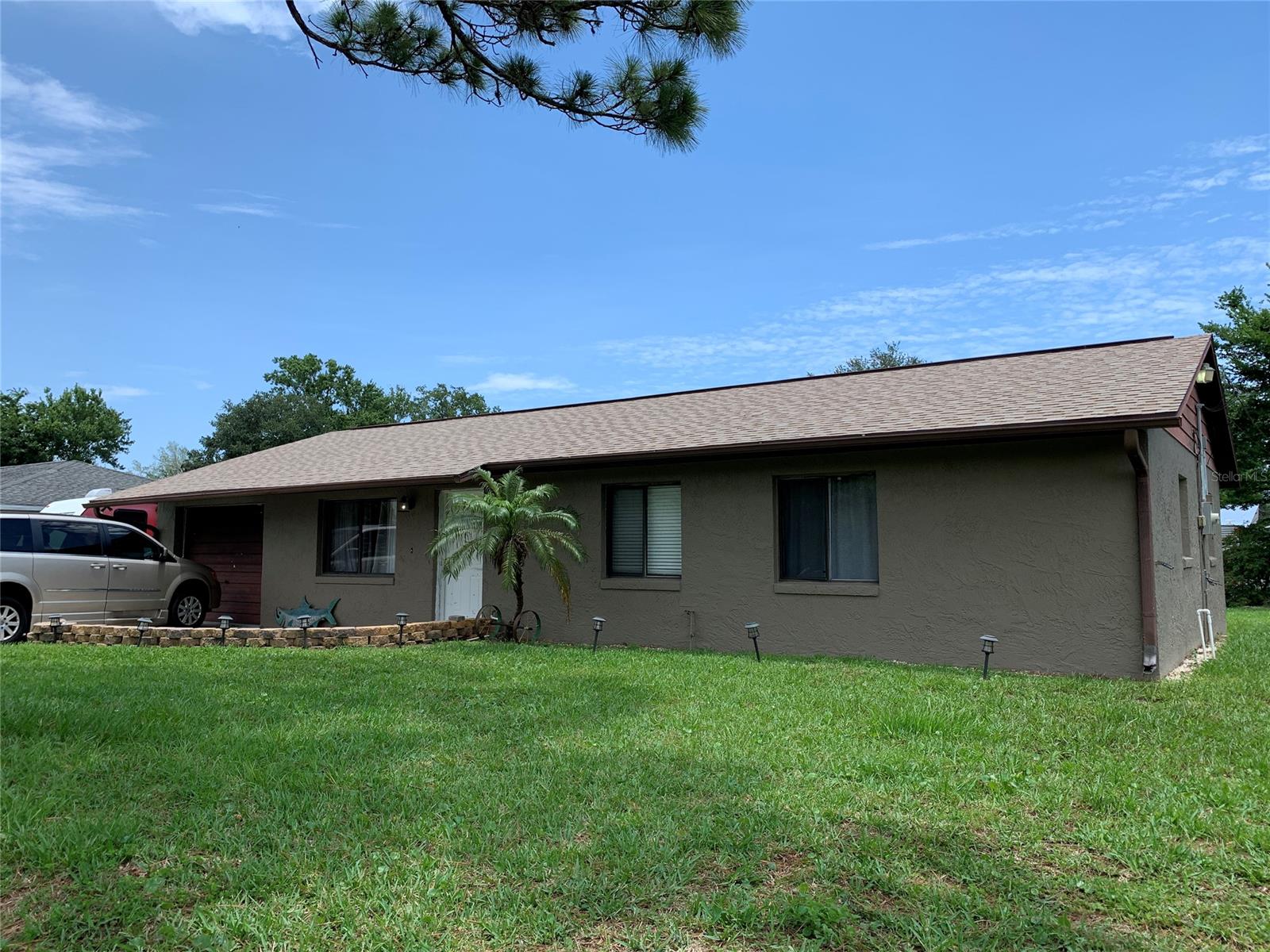 Concrete block 2/2 located in a quiet neighborhood has been modified by its' current owner to be handicap accessible as well as new kitchen, all new flooring, newer roof 2018 & HVAC 2012. Garage has been converted to living/storage space, but could be changed back to a garage. ;Water: City