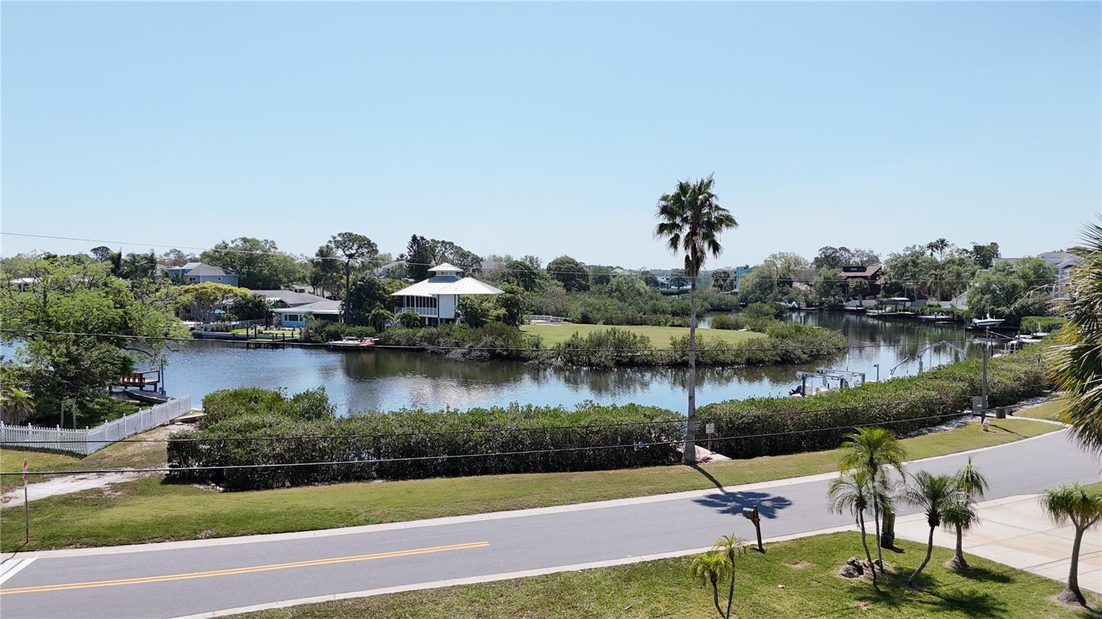 Don’t just build a home, build your future in the heart of Ozona, one of Pinellas County’s most sought-after coastal communities.
This exceptional homesite is cleared and leveled, offering a rare opportunity to fast-track your build in a location where waterfront and water-access properties are increasingly hard to find. With access to Brooker Creek and the Gulf of America, this property delivers the best of Florida coastal living, whether you’re heading out by boat or simply soaking up the water views and natural surroundings.
An added advantage: Pinellas County has future plans to increase the clearance of the Shore Drive bridge, which is expected to allow for larger vessels to pass, further enhancing the long-term boating appeal of this location.
The main lot offers approximately 116 feet of depth by 82 feet of width (9,512 sq ft), with an additional 1,848 sq ft parcel located along the water on the east side of Lagoon Dr, bringing the total to approximately 11,360 sq ft. This unique configuration provides flexibility for design, outdoor living, and maximizing your waterfront experience.
Location is everything, and Ozona delivers. Known for its golf cart-friendly lifestyle and tight-knit coastal charm, this community offers easy access to local marinas, waterfront dining, and some of the area’s most beloved restaurants and gathering spots. Spend your days on the water, your evenings catching sunsets on a golf cart ride, and your weekends enjoying nearby amenities like the Sunderman Sports Complex and the scenic Pinellas Trail.
The property is also conveniently located near Ozona Elementary and Palm Harbor University High School, making it an easy everyday lifestyle choice.
Opportunities like this, cleared, build-ready land with water access, Gulf connectivity, and future upside are incredibly rare in Ozona.
Don’t just live… live coastal.
Survey and soil test available.