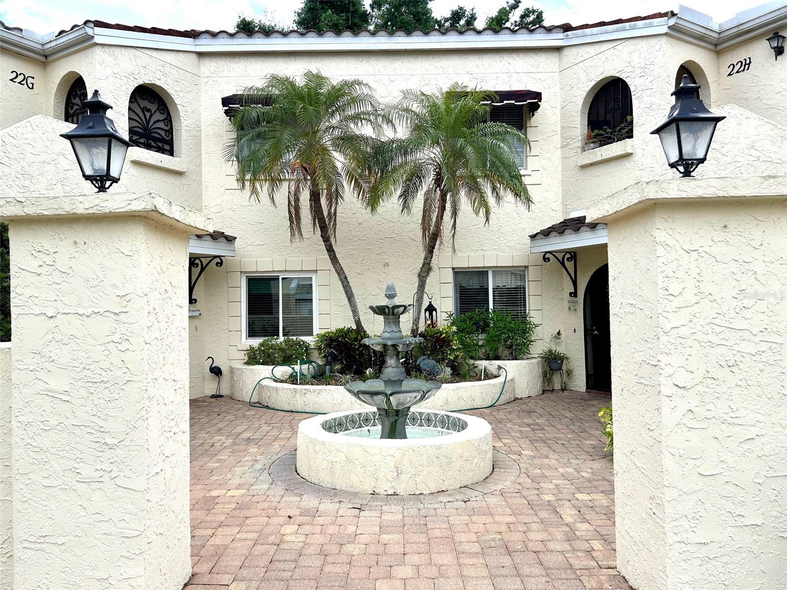 The much sought-after Florida life style can be yours to cherish and enjoy in this charming condo at Vizcaya. Come home to this gorgeous 2 bedroom plus den second floor end unit that comes complete with vaulted ceilings, a 38 ft long lanai, a carport, and lots of guest parking spaces. You'll fall in love with the open floor plan of this Hibiscus model! A spacious eat-in kitchen will inspire you to sharpen your culinary talents and host memorable dinner parties. The formal dining area looks out onto a colorful garden view from the ultra long lanai. The living room also offers serene views from the lanai and it flows seamlessly into the den. This multi-use den serves as a perfect space for an office, library, media room, or yoga room. Need some quiet time to contemplate on your next project? The den offers water and garden views from a private balcony. Need storage space? There is plenty of room for all your belongings in the carport storage area, as well as in the storage and utility room in the lanai. Amenities include a large heated pool and spa for your therapeutic moments, and a clubhouse for all your social engagements. Need to get down to a beach quickly? A 15-minute drive will take you to the world famous beaches of Anna Maria Island. Vizcaya is a gated community of 256 units located on 32 acres of land in the heart of Bradenton. Each building is inspired by the captivating Spanish architecture of the Mediterranean. With four lakes on the property and beautifully landscaped grounds filled with tropical palms and majestic oaks, Vizcaya is truly a wonderful place to call home.
