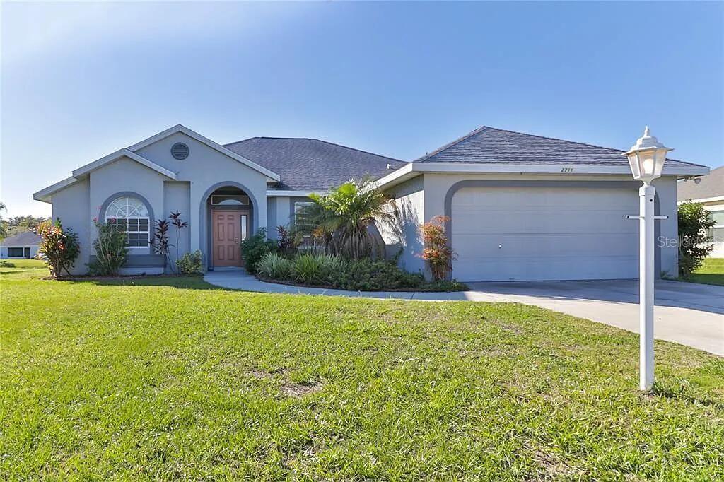 Experience the perfect blend of space, comfort, and waterfront living in this beautifully maintained 3-bedroom, 2-bath home located in the highly desirable Sugar Mill Lakes community of Palmetto. More than 2,100 square feet of thoughtfully designed living space, this residence features an open, split-bedroom floor plan that provides both privacy and functionality.
The spacious living and dining areas flow seamlessly into the heart of the home, creating an inviting setting for everyday living and effortless entertaining. The well-appointed kitchen has abundant cabinetry, generous counter space, and a practical layout designed to keep everything within easy reach.
The private owner's suite serves as a relaxing retreat, complete with a large walk-in closet and an en-suite bath. Two additional bedrooms provide flexibility for family, guests, or a home office.
Step outside to the oversized screened lanai and enjoy peaceful lake views-the perfect backdrop for your morning coffee, evening sunsets, or entertaining friends and family while embracing Florida's year-round outdoor lifestyle. A new roof provides added value and peace of mind for years to come.
Sugar Mill Lakes is known for its scenic lakes, low HOA fees, and convenient location just minutes from I-75 and I-275, making commuting to Tampa, St. Petersburg, Sarasota, and Bradenton simple. Shopping, dining, parks, golf courses, marinas, and the Gulf Coast's world-renowned beaches are all within easy reach.
Whether you're searching for a full-time residence or a seasonal retreat, this exceptional lakefront home delivers the lifestyle you've been waiting for. Discover everything this beautiful home has.