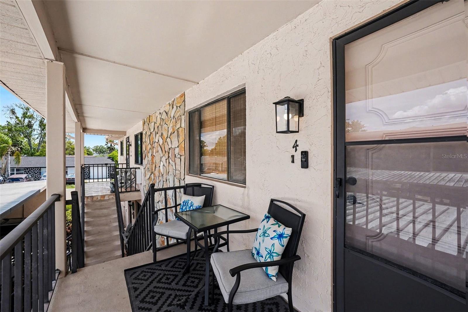 Charming, 2BR/2BA condo in the highly desirable 55+ Eagles Point waterfront community with direct Gulf access. This beautifully maintained home features an open-concept layout, stunning floor-to-ceiling stone fireplace, and a versatile enclosed bonus room—perfect for a home office or guest space. Enjoy a spacious kitchen with ample cabinetry, pantry, and breakfast bar, plus in-unit washer/dryer for convenience. Relax year-round in the large enclosed lanai and retreat to a generous primary suite.

Resort-style amenities include a heated pool, clubhouse, fitness center, billiards room, private dock, and kayak storage. HOA covers water, sewer, trash, cable, flood insurance, roof, and exterior maintenance for truly low-maintenance living. Rentals allowed immediately—great investment opportunity.

Prime location near shopping, dining, downtown New Port Richey, Tarpon Springs, Gulf beaches, and Tampa International Airport. Experience the best of Florida waterfront living with wildlife views and sunset skies right outside your door.