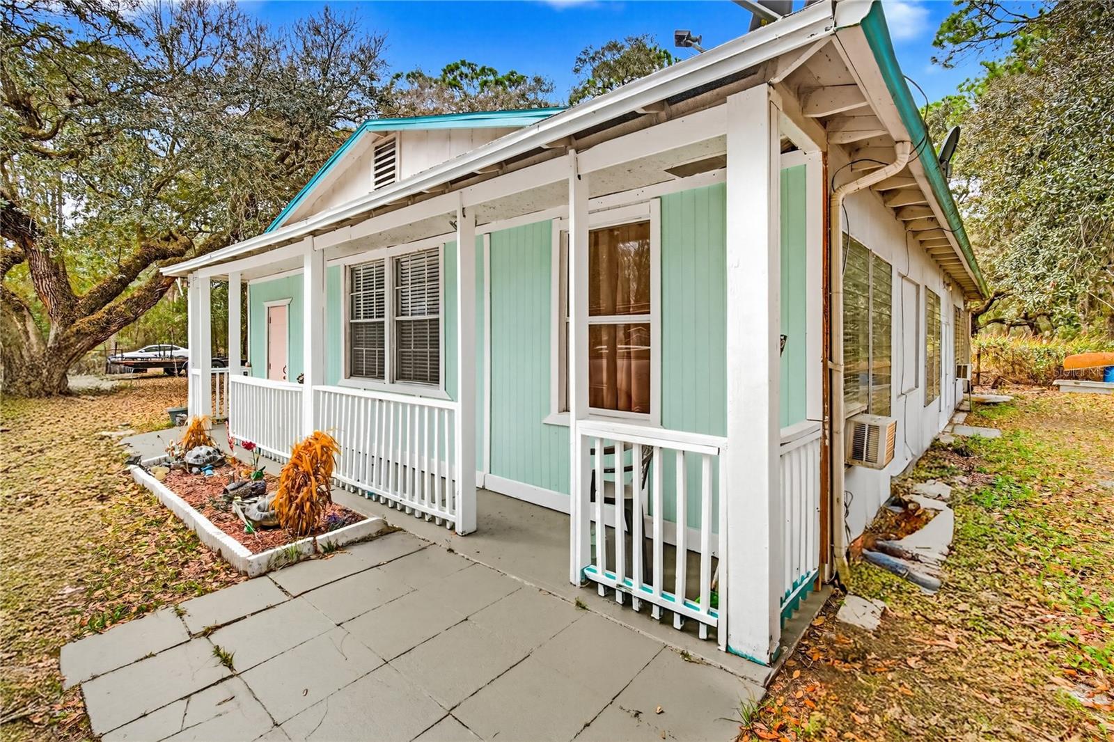 Welcome to your peaceful retreat near the scenic Withlacoochee River in beautiful central Florida! This charming 3 bedroom, 1 bathroom home has been thoughtfully updated and offers modern comfort in a serene, nature-filled setting. Step inside to find two spacious living areas perfect for family gatherings, a home office, or relaxing in separate zones. The updates bring fresh appeal with contemporary finishes, while the practical layout includes ample storage space to keep everything organized. Outside, enjoy the convenience of an outdoor laundry area. and a fully fenced yard on a desirable corner lot, providing extra privacy, room to play, and easy access from multiple sides. The corner position offers additional yard space and a welcoming curb appeal. Just minutes from the Withlacoochee River, this location is ideal for outdoor enthusiasts. Paddle, fish, hike, or simply unwind along the river's shores, surrounded by the natural beauty of nearby state forests and trails. Enjoy a laid-back lifestyle with easy access to wildlife, recreation, and the tranquility that makes this area so special. Whether you're seeking a primary residence, vacation getaway, or investment property, this updated home delivers comfort, functionality, and a prime spot near one of Florida's most picturesque rivers. Don't miss your chance to own this slice of peaceful paradise!