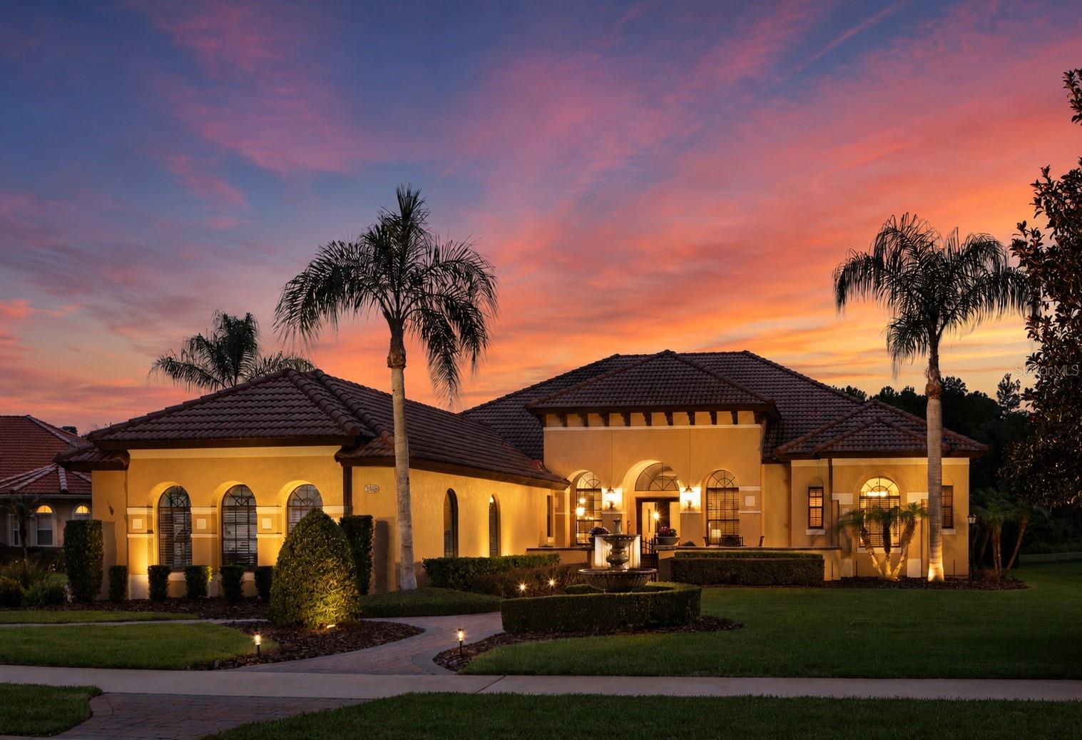 Each evening, breathtaking sunsets paint the western sky, casting a spectacular display of color across the peaceful conservation beyond your backyard. Perfectly positioned on a quiet cul-de-sac within the gated community of Estates at Wekiva, this exceptional 3,400-square-foot residence with an oversized three-car garage offers a rare blend of privacy, natural beauty, and everyday luxury. Just beyond the community entrance, Wilson Landing Park provides direct access to the Wekiva River with kayak and canoe launches, while the nearby Wekiva Parkway places Lake Mary, Mount Dora, Downtown Orlando, Orlando International Airport, world-famous attractions, and Florida's east coast beaches all within easy reach.

A private courtyard entry welcomes you into an interior where soaring ceilings, abundant natural light, and expansive windows frame the pool, conservation, and unforgettable sunset views. The split floor plan features four bedrooms, four bathrooms, and a private office, creating an ideal balance of elegant entertaining and comfortable everyday living. A welcoming living room anchors the home, complemented by a formal dining room for special occasions and a spacious family room surrounded by walls of windows that showcase the backyard beyond. Tile flooring extends throughout the main living areas, new carpet enhances the bedrooms and office, and automatic shades in the family room and primary suite provide effortless comfort and convenience.

Open to the family room, the expansive kitchen is designed for gathering. New premium built-in stainless steel appliances are complemented by abundant cabinetry, expansive granite countertops, a generous center island, wraparound breakfast bar, a dedicated workspace, and a sunny breakfast nook overlooking the lanai, pool, and conservation.

The private primary suite occupies its own wing with dual walk-in closets, a spacious bath, and automatic shades. A full pool bath adjacent to the office provides convenient access for guests, while the opposite wing features three additional bedrooms served by two baths, including a Jack-and-Jill bath shared by two bedrooms, creating a layout that comfortably accommodates family and overnight visitors.

Outdoor living is equally impressive. A large screened lanai overlooks an expansive travertine terrace surrounding the resort-style pool and spa with multiple water features, solar heating, and an outdoor shower. Beyond the screened enclosure, the oversized fenced backyard backs to conservation with no rear neighbors, providing exceptional privacy and plenty of space for recreation, pets, and entertaining. As the day gives way to evening, the western exposure creates a breathtaking backdrop for relaxing beside the pool, hosting friends, or simply unwinding while the sunset colors illuminate the conservation beyond.

Additional features include EV charging, newer HVAC systems, automatic screens and new community pickleball courts.

Combining spectacular sunset views, resort-inspired outdoor living, and one of Sanford's most desirable gated locations, this exceptional residence offers a lifestyle that feels both private and connected, where nature, convenience, and luxury come together in balance.