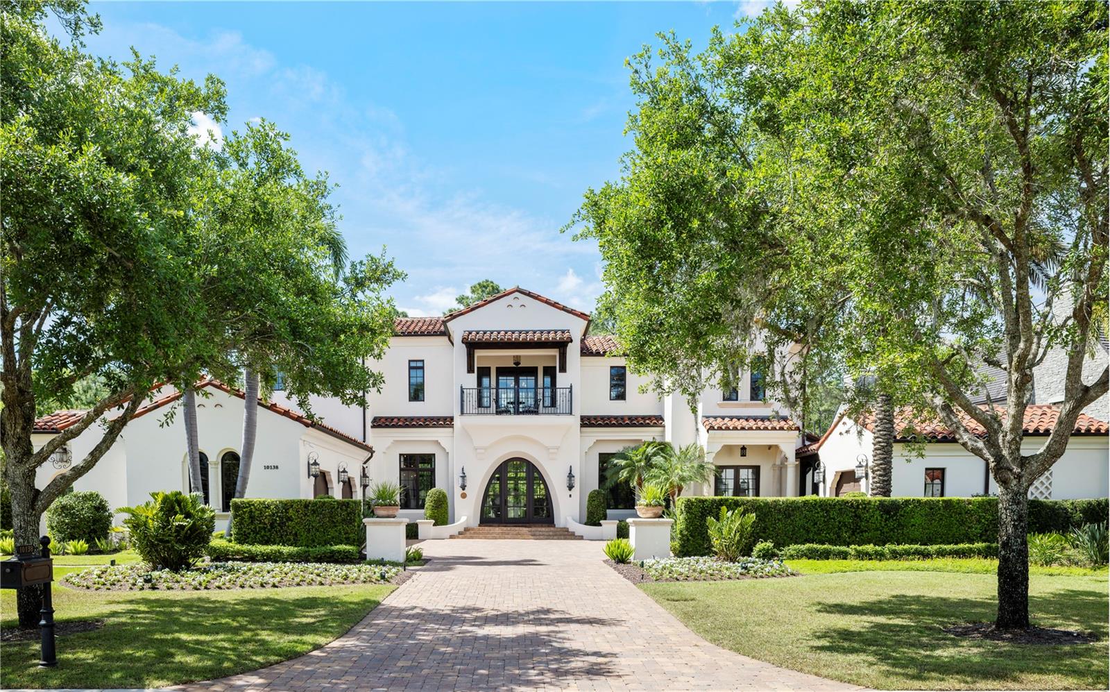 Discover Montecito, a Spanish-inspired 2-story home offering a luxurious retreat for family and guests. The charming arched doorways, sumptuous great room with exposed beams, and abundant natural light create an inviting atmosphere. Outdoor amenities include an impressive summer kitchen, expansive pool with sun shelf and spa, and scenic conservation views. The main level features two bedrooms and a versatile multi-purpose room, perfect for an office. Upstairs, a private casita with its own stairway and balcony overlooks the pool. The primary bedroom boasts a private porch. The home is also equipped with an updated low voltage system for convenience and efficiency. Garage spaces are fully air-conditioned and the 1-car garage includes a car lift. Golden Oak at Walt Disney World® Resort is a residential resort community where families can live in the embrace of luxury, privacy and the magic of Disney. This gated community features distinctive neighborhoods of magnificent homes, expansive natural preserves and inviting amenities—including access to Golden Oak’s private clubhouse, Summerhouse, with superb food offerings served in a casually elegant dining room, courtyards, pool area, fitness facilities, and family room.  In addition, residents have access to Club Life, Your Special Connection to the Magic, including access to the Golden Oak Member Services team, park transportation, signature club events, theme park experiences, Extra Magic Hours and much, much, more.  Also at Golden Oak is Four Seasons Resort Orlando at Walt Disney World Resort, which hosts an 18-hole Tranquilo golf course, full-service spa, meeting facilities, and superlative restaurants.