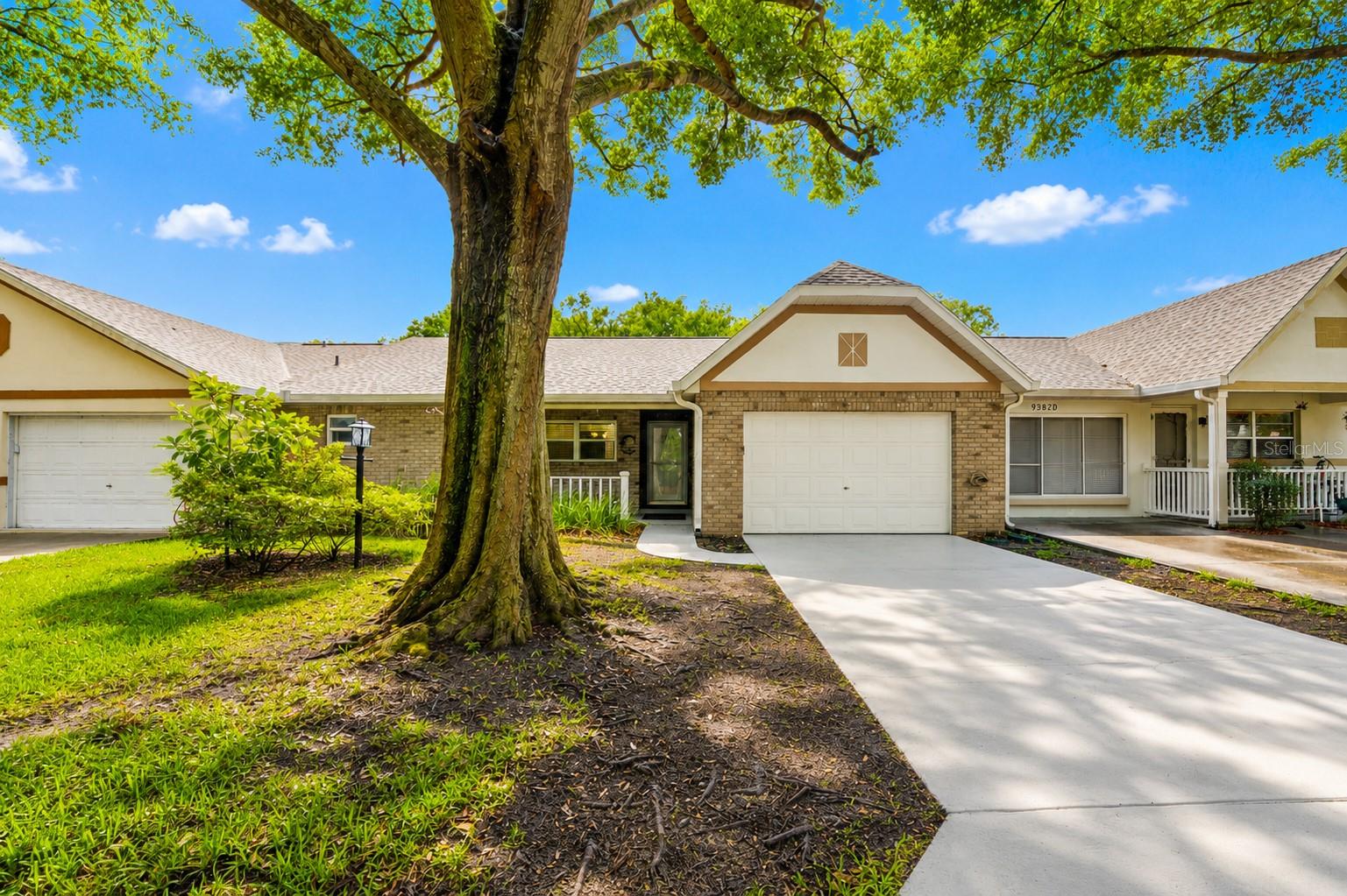 Welcome to this Sienna II model in On Top of the World, offering 2 bedrooms, 2 bathrooms, and a 1.5-car garage with space for both a vehicle and golf cart. The open living area features vaulted ceilings that enhance the spacious feel of the home. The light and bright kitchen showcases new granite countertops, ample cabinetry, and overlooks the front porch.

The primary suite includes an en-suite bath with a large vanity and walk-in shower. The guest bedroom is situated in a separate wing of the home with convenient access to the second bathroom, providing privacy and functionality.

Additional living space includes a Florida room, perfect for enjoying natural light year-round. Step outside to the covered rear porch, an ideal spot for relaxing, entertaining, or enjoying the outdoor setting.

Located in On Top of the World, this golf cart-friendly community offers a variety of recreational amenities, clubs, and activities, along with convenient golf cart access to nearby shopping, dining, entertainment, and everyday services.