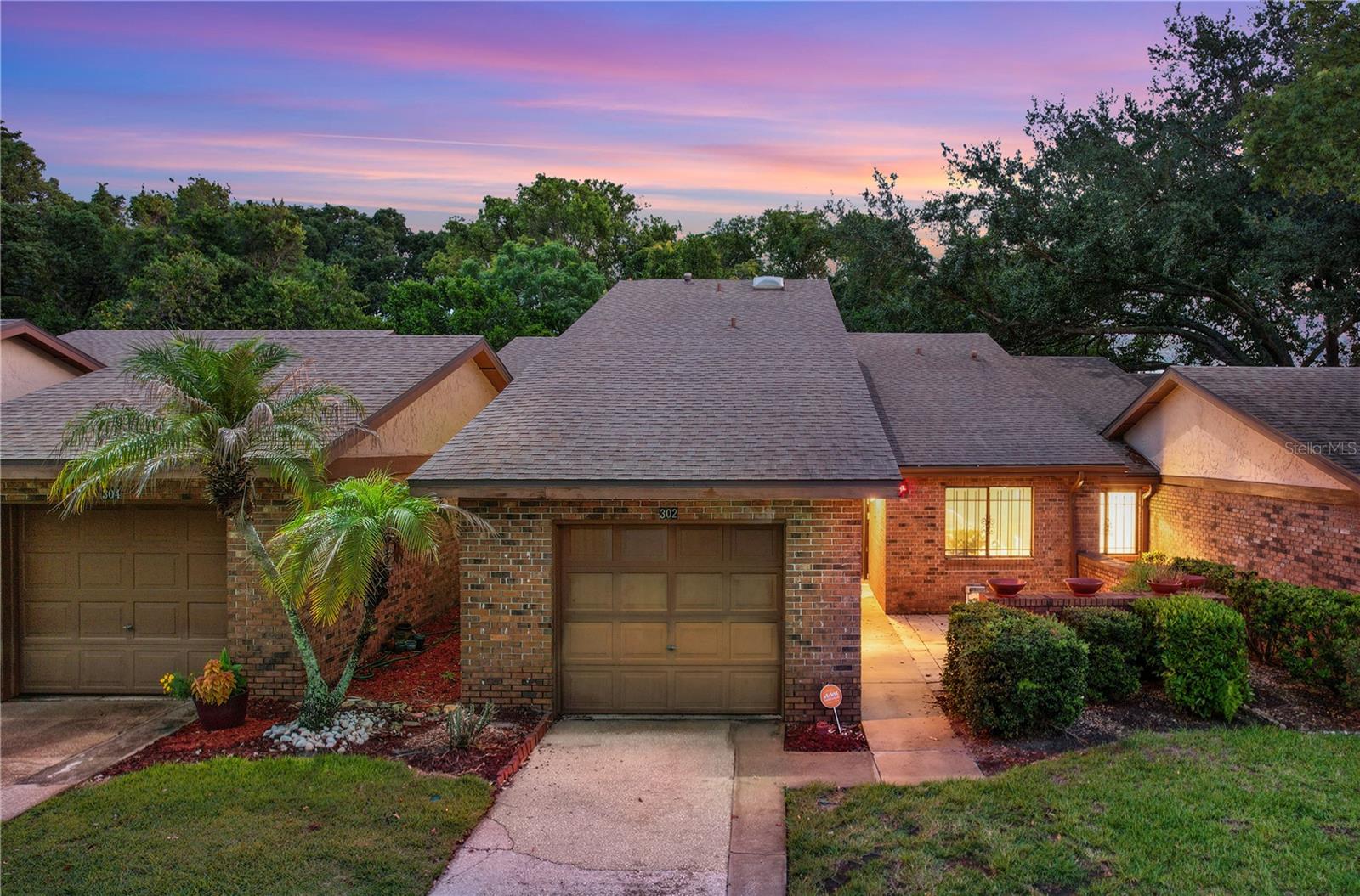 Virtually Staged. Welcome to 302 Sand Trap Cove, a charming one-story villa located in the desirable Wekiva Villas on the Green community in Longwood. This well-maintained 3-bedroom, 2-bathroom home offers an easy blend of comfort, function, and relaxed Florida living.

Inside, you’ll find an open layout where the kitchen connects naturally to the living and dining areas, creating a bright and comfortable space for everyday living and entertaining. The kitchen features granite countertops, stainless steel appliances, recessed lighting, and a cozy eat-in nook that is perfect for casual meals or morning coffee.

The living and dining room offers vaulted ceilings and expansive windows that bring in an abundance of natural light while showcasing peaceful views of the surrounding greenery. The spacious primary suite includes an ensuite bath with dual vanities, a walk-in shower, and a large walk-in closet. Two additional bedrooms share a full bath and offer flexibility for guests, a home office, or hobby space.

Wekiva Villas on the Green offers a wonderful community setting with amenities including a pool overlooking the golf course, tennis courts, walking trails, and a playground. The location is also close to Wekiva Golf Club, Wekiva Island, and Wekiva Springs State Park, making it ideal for those who enjoy outdoor recreation.

Conveniently situated near Seminole County schools, Publix, parks, dining, and shopping, this villa offers a lifestyle that is both peaceful and practical. Whether you are looking to downsize, invest, or find a comfortable primary residence, this Wekiva home is a fantastic opportunity.