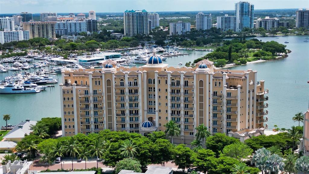 Want to live DIRECTLY on the water in downtown Sarasota away from the noise and congestion in a neighborhood intimate community? You found it at La Bellasara on Golden Gate Point. Enjoy breathtaking sparkling Bay, City and beyond views from this full 3 bedroom plus den with private 2-car garage and your own private boat dock for a 45 ft boat. With only 28 residences, each one lives like a home.  The elevator delivers you directly to your private double-door entry foyer. The gourmet kitchen features a center island, 6-burner gas stove and walk-in pantry all open to the breakfast, dining & great rooms with amazing water views and access to an oversized waterfront terrace equipped with a summer kitchen and gas grill! Wake up in the main bedroom to picture-perfect water views as you step out to the terrace for your first cup of morning coffee. The separate, private guest wing has two full bedrooms with en-suite baths plus a study or possible 4th bedroom.  La Bellasara is a gated, pet-friendly community with excellent amenities including concierge services, a full fitness center, armchair theatre and entertainment room, a bay-front heated pool & spa plus a community day dock.  HAVE IT ALL! Room Feature: Linen Closet In Bath (Primary Bedroom).