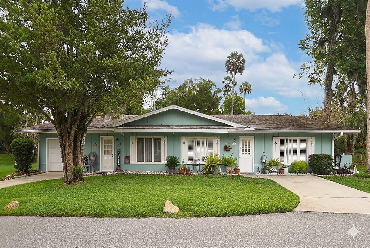 Welcome to easy Florida living in the charming 55+ community of Country Club Chalet in New Smyrna Beach! This beautifully updated home features stylish LVP flooring throughout, updated baseboards and cabinetry, beautifully tiled kitchen and baths, plantation shutters, and a screened porch perfect for enjoying your private garden setting. One of the biggest advantages? The incredibly affordable $372/month HOA fee covers exterior maintenance including roof, paint, and yard care -- plus valuable extras like Wi-Fi and cable TV. Enjoy low-maintenance living just minutes from everything we love about New Smyrna Beach: Golf, Beach, Canal Street Historic District and Flagler Avenue on the Beachside.