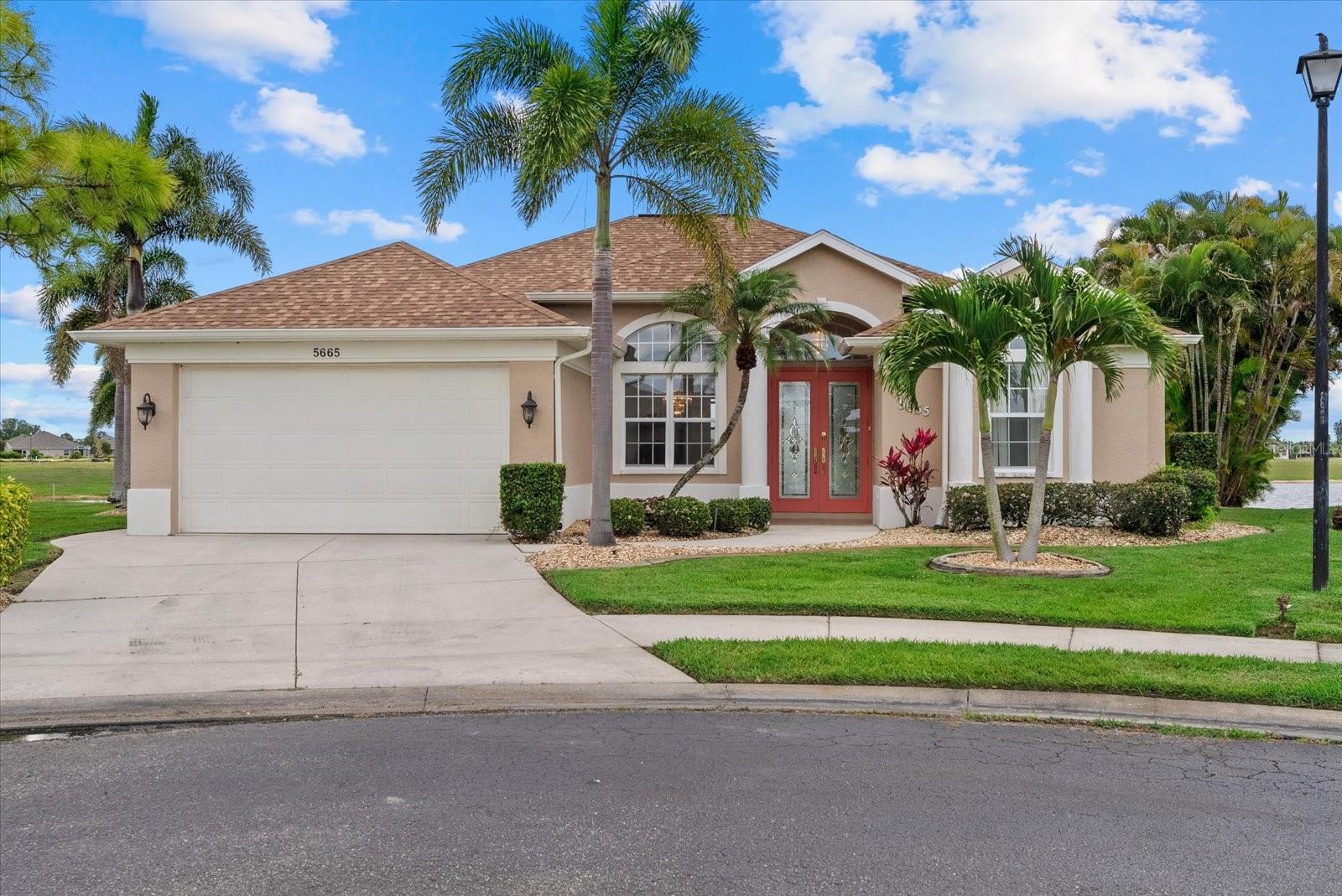 A beautiful lakefront home on a quiet cul-de-sac in the desirable gated community of Sabal Trace Single Family. As you enter the home through the double front doors, the 12-foot high ceilings of the foyer with its crown molding and inset mirrored wall welcomes you in. To the left of the foyer is the formal dining room, also, with 12foot ceilings with crown molding and arched entrance from the foyer and the kitchen. The foyer opens into the open concept of living room, dinette and kitchen. The open area has cathedral ceilings, chair rail throughout and ceramic tile in the entire home. No carpet. The living room and dinette open onto the lanai by way of double corner pocket sliders allowing wonderful views and gentle breezes. The living room also has a double window allowing natural light and views. The kitchen has Corian countertops, tiled back splash, breakfast bar, closet pantry, newer stainless steel appliances and ample workspace for the chef in the family. The spacious master bedroom has cathedral ceilings, a walk-in and a double door closet and a double slider door that pockets out of the way for views and access to the lanai, pool area and the lake. The master bedroom has an en suite master bath. The master bath has a double sink vanity with a dressing table., walk-in shower and a jetted soaking tub. The split floor plan offers two additional bedrooms and bathroom. The second bedroom has a double door closet. the third bedroom has double entrance doors, cathedral ceiling, double window that offers natural light and views of the lake and has a double slider that pockets out of the way with access to the lanai and pool area. The guest bathroom has a single sink vanity and a full walk-in shower. The home has laundry room off of the kitchen with full size washer and dryer as well as a sink and cabinet. The home has a 2-car garage with an additional side door for easy entrance. The focal point of the home is not just the oversized lot at the end of the quiet cul-de-sac but the lanai, pool and panoramic views of the lake. The lanai has a covered area that is 9x16 for enjoying your morning coffee as the sun rises or for relaxing for the afternoon wine and cheese. The lanai offers a screened area 32x24 with heated pool with spa and a decorative rock formation enjoying the FL lifestyle. The lanai also has a utility closet for all of your water toys and floats. All of these plus wide picturesque lake views. The property has lake frontage of 145 feet. The property has mature landscaping both for beauty and privacy. The community is located close to shopping, restaurants, golf courses, local beaches, world class fishing and area attractions. Who could ask for more?


h