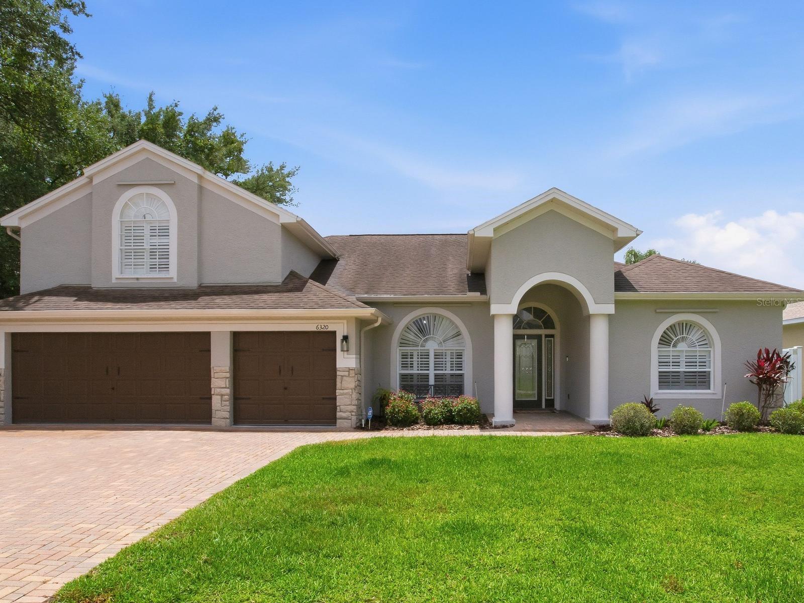 Tucked away in a peaceful Citrus Park/Carrollwood setting, this stunningly transformed 4-bedroom, 3-bath home is the retreat you’ve been searching for. Thoughtfully renovated from top to bottom, the heart of the home is a true chef’s kitchen featuring GE Café appliances, pot filler, quartz countertops, a large island with seating for five, and a wine fridge — all complemented by LVP flooring throughout, elegant sconce lighting, an added study, and spa-inspired bathrooms refreshed with granite countertops, updated fixtures, and hardware. One of the home’s most unique and desirable features is its exceptional privacy — with no direct neighbors in front, beside, or behind the property, creating a quiet, secluded setting that’s hard to find in Tampa Bay. Step outside into a private paradise built for entertaining and relaxation. The backyard boasts an outdoor kitchen, a concrete patio with an 18x12 gazebo, a bistro sitting area, and a stunning pool and spa shaded by a sail — all overlooking a serene private pond. A vinyl privacy fence, added shed, and fully repainted exterior round out the outdoor experience beautifully. Smart whole-home upgrades bring peace of mind and efficiency, including a generator transfer switch, replaced air ducts, garage ceiling storage, and a stacked laundry room with added cabinetry. Every detail in this home was chosen with intention — creating a lifestyle, not just a living space. Schedule your private showing today.
