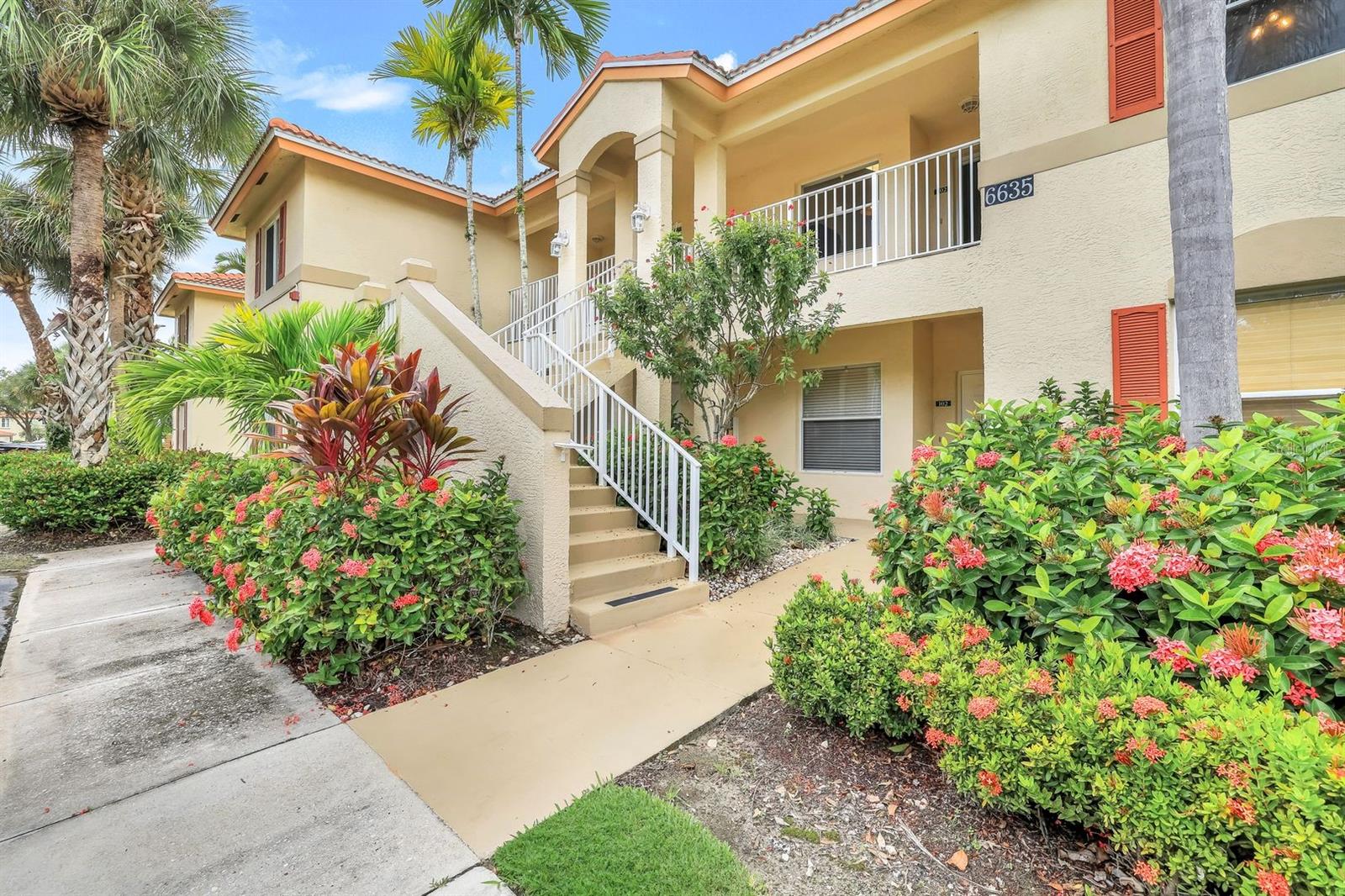 Naples living at a price you’ll love! This beautifully updated 2-bedroom, 2-bath second-floor condo, with balcony, offers a serene private treed view and the added elegance of a cathedral ceiling, available only on upper-level residences. Inside, you’ll find new flooring, fresh paint, and stylish ceiling fans, while the kitchen shines with stainless steel appliances and a convenient pass-thru to the dining area for effortless entertaining. An added bonus with this unit is the concrete carport with tile roof! Enjoy resort-style amenities including bocce and tennis courts, a sparkling pool, and a well-appointed amenities center featuring a fitness room, billiards room, and inviting community rooms. Just 6 miles from Naples’ pristine white-sand beaches and moments to the upscale dining, boutiques, and galleries of 5th Avenue South, this condo offers both luxury and convenience. Discover a budget-friendly opportunity to live the resort lifestyle in one of Florida’s most desirable destinations.