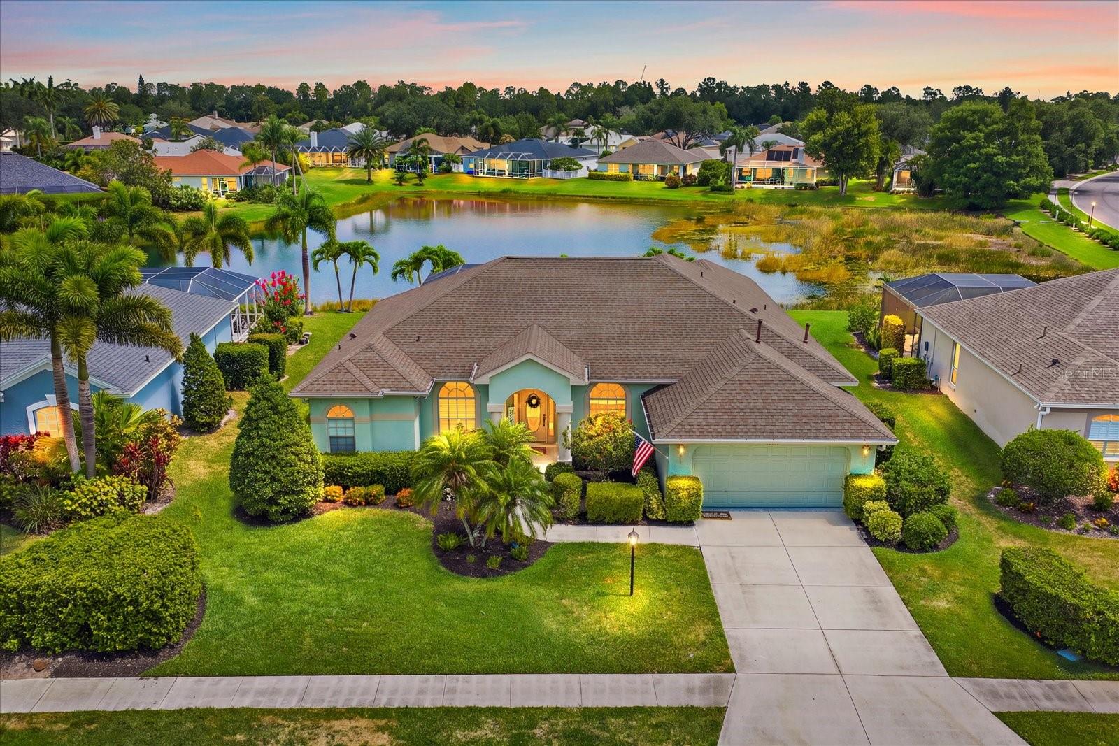 WELCOME HOME to 12111 Summer Meadow in THE SUMMERFIELD GLADES ~ The heart of Lakewood Ranch, where SPACIOUS LIVING, ABUNDANT NATURAL LIGHT, and STUNNING WATER VIEWS create the perfect backdrop for Florida living. BIG-TICKET ITEMS have been taken care of for you, INCLUDING:
**NEW ROOF (2018)
**NEW A/C (2018)
**NEW WATER HEATER (2020)
 This bright and airy home features a thoughtfully designed floor plan with expansive living areas, soaring ceilings, and large windows that fill the home with sunshine while showcasing picturesque views of the pool and pond beyond.

Whether you're looking to move right in or add your own personal touches over time, this home offers the perfect blank canvas to create the space you've always envisioned. The generous layout provides plenty of room to spread out, while the abundance of natural light creates a warm and inviting atmosphere throughout.

The seamless connection between the interior living spaces and the outdoor lanai allows the beautiful pond views to remain the focal point of the home. Step outside to your private pool and enjoy the tranquility of the water, gentle breezes, and the ever-changing scenery that makes this setting so special.

Nature lovers will appreciate the incredible wildlife just outside their door. Watch turtles bask along the pond's edge, sandhill cranes wander through the community, ducks glide across the water, and herons nest nearby. The peaceful surroundings create a daily connection to nature rarely found in today's market.

When you step out your front door, you’ll look straight down the cul-de-sac to Heron’s Nest Nature Preserve, where miles of scenic walking and biking trails begin just beyond the neighborhood. This unique location places one of Lakewood Ranch's most beautiful natural areas just moments away. Summerfield residents also enjoy access to Summerfield Park, tennis and pickleball courts, baseball and soccer fields, dog parks, playgrounds, and a community pavilion for gatherings and events. With an incredibly low HOA of just $102 per year, you'll enjoy all the benefits of living in Lakewood Ranch, the #1 Master-Planned Community in the USA. Conveniently located near I-75, top-rated schools, world-class dining, shopping, and entertainment, and just 30 minutes from Sarasota's world-famous beaches. LIVE ON VACATION NOW!