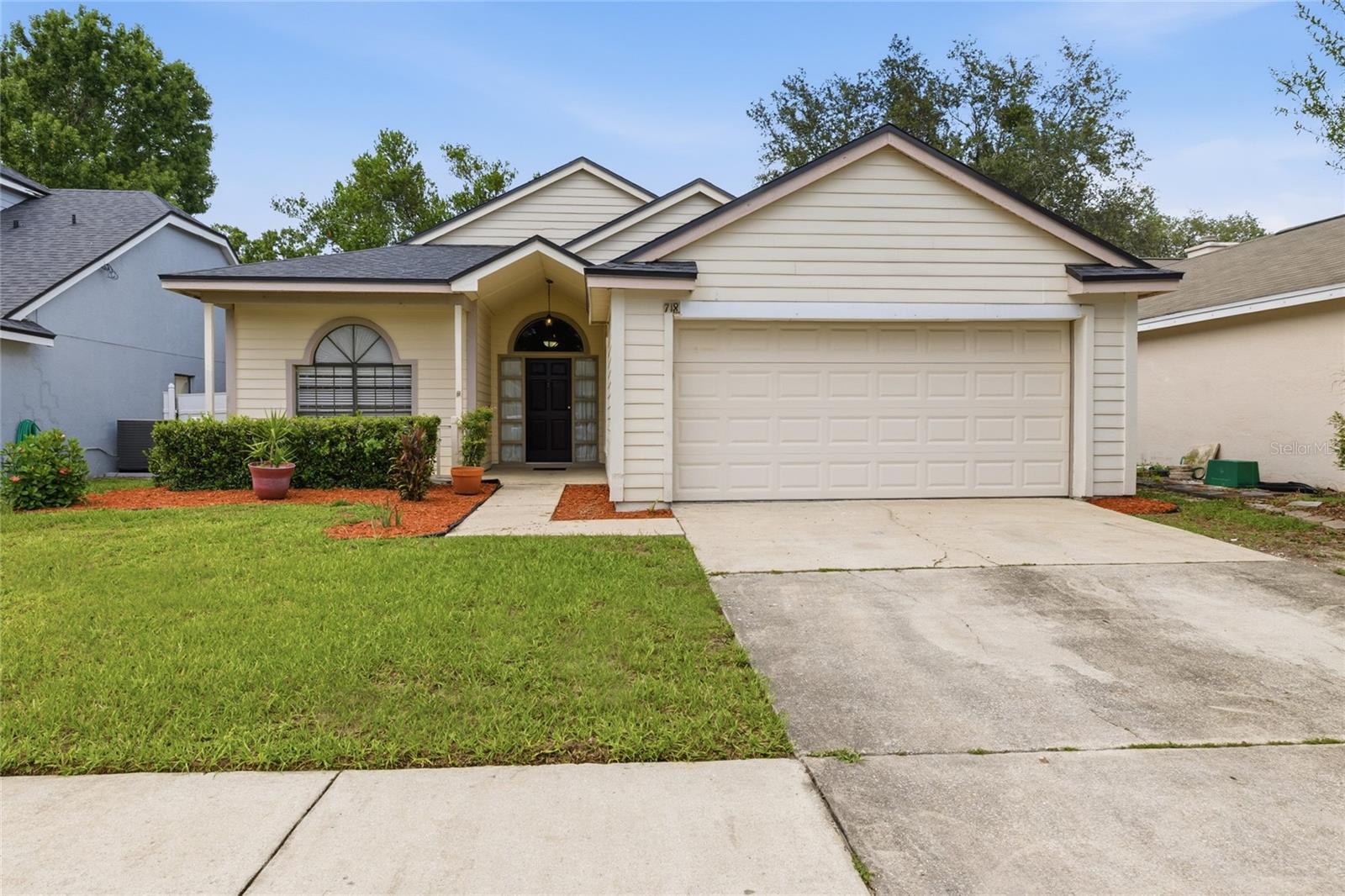 Virtually Staged. Welcome to this well maintained 3-bedroom, 2-bath home in the highly desirable Greenwood Lakes community of Lake Mary! Featuring a spacious split-bedroom floor plan with a formal living and dining combo, plus an inviting family room that opens to the kitchen, this home offers the perfect blend of comfort and functionality. The private primary suite includes dual vanities, a garden tub, separate shower, and walk-in closet. Step outside to enjoy the screened lanai overlooking a fully fenced backyard—ideal for relaxing, entertaining, or pets. Major updates provide added peace of mind, including a new roof (2023), new HVAC system (2026), and new water heater (2026). Conveniently located just minutes from Lake Mary Boulevard, I-4, shopping, dining, parks, and entertainment, and zoned for highly rated Lake Mary schools, this move-in-ready home is one you won't want to miss. Schedule your private showing today!