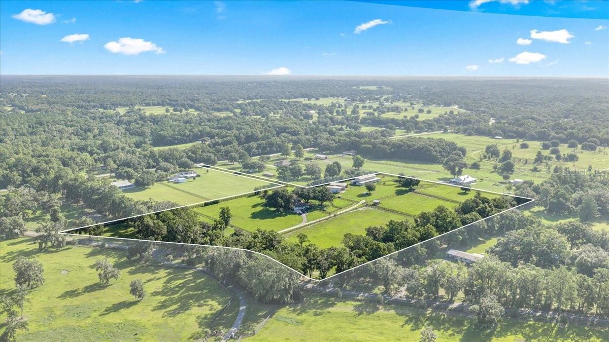 Set in Marion County, the Horse Capital of the World, this nearly 16-acre farm offers the rare combination of scale, infrastructure, and location that serious equestrian buyers look for and seldom find. The main home spans over 5,000 square feet, anchored by a private pool space designed for both everyday living and entertaining. Beyond the residence, the property is built to work: a 5-stall barn and a second 17-stall barn complete with a barn apartment, ideal for staff, trainers, or additional income potential. For those thinking ahead, the second barn offers the opportunity to build out above the existing structure( framed and ready for your vision) additional living space or storage without expanding the farm's footprint. The grounds are equipped for training and turnout alike, with a round pen, multiple paddocks, RV and trailer parking, and a dedicated storage building. Two entrances provide flexibility for the traffic a working farm demands.
Sitting just 5.6 miles from HITS and 12 miles to WEC, placing this property at the center of the region's premier equestrian sport circuit.
This is a farm with the bones already in place — ready for a buyer with the vision to take it further. Video tour, survey, and current plans available.
