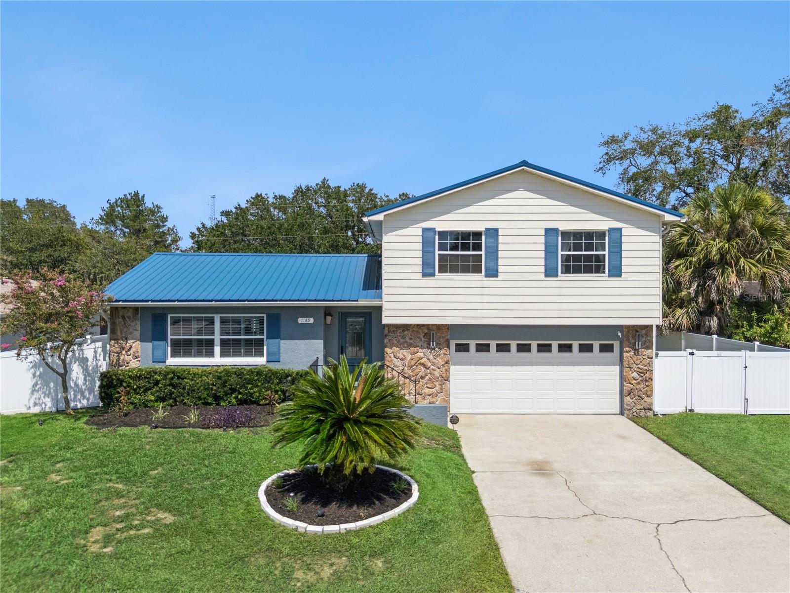 Welcome to your own private backyard oasis in the heart of Winter Park! This beautifully maintained two-story home offers 4 bedrooms, 2 bathrooms, and the perfect blend of comfort, style, and outdoor living. With no HOA, a fully fenced backyard, and a sparkling pool, this home delivers the Florida lifestyle buyers have been searching for. From the moment you arrive, you'll appreciate the pride of ownership throughout. The home features a 2022 metal roof, 2021 gutters, 2020 insulation, a 2019 A/C, and a new garage door and opener installed in 2023, giving buyers peace of mind for years to come. Inside, the home has been refreshed with fresh interior paint, updated door hardware throughout, updated kitchen hardware, and tasteful finishes that create a bright and welcoming atmosphere. Just beyond the living spaces, the screened patio provides the perfect transition to your backyard oasis. The backyard is truly the highlight of the home, featuring a pool resurfaced in 2024, a replaced pool pump motor, an expansive patio, a pergola, and a built-in sound system that conveys with the home, creating the perfect setting for relaxing or entertaining family and friends. The generous, fully fenced backyard offers plenty of space for pets, play, gardening, and enjoying the outdoors. Move-in ready and loaded with valuable updates, this exceptional Winter Park pool home offers comfort, functionality, and an unbeatable outdoor lifestyle. Conveniently located near shopping, dining, parks, and major roadways, this is one you won't want to miss!