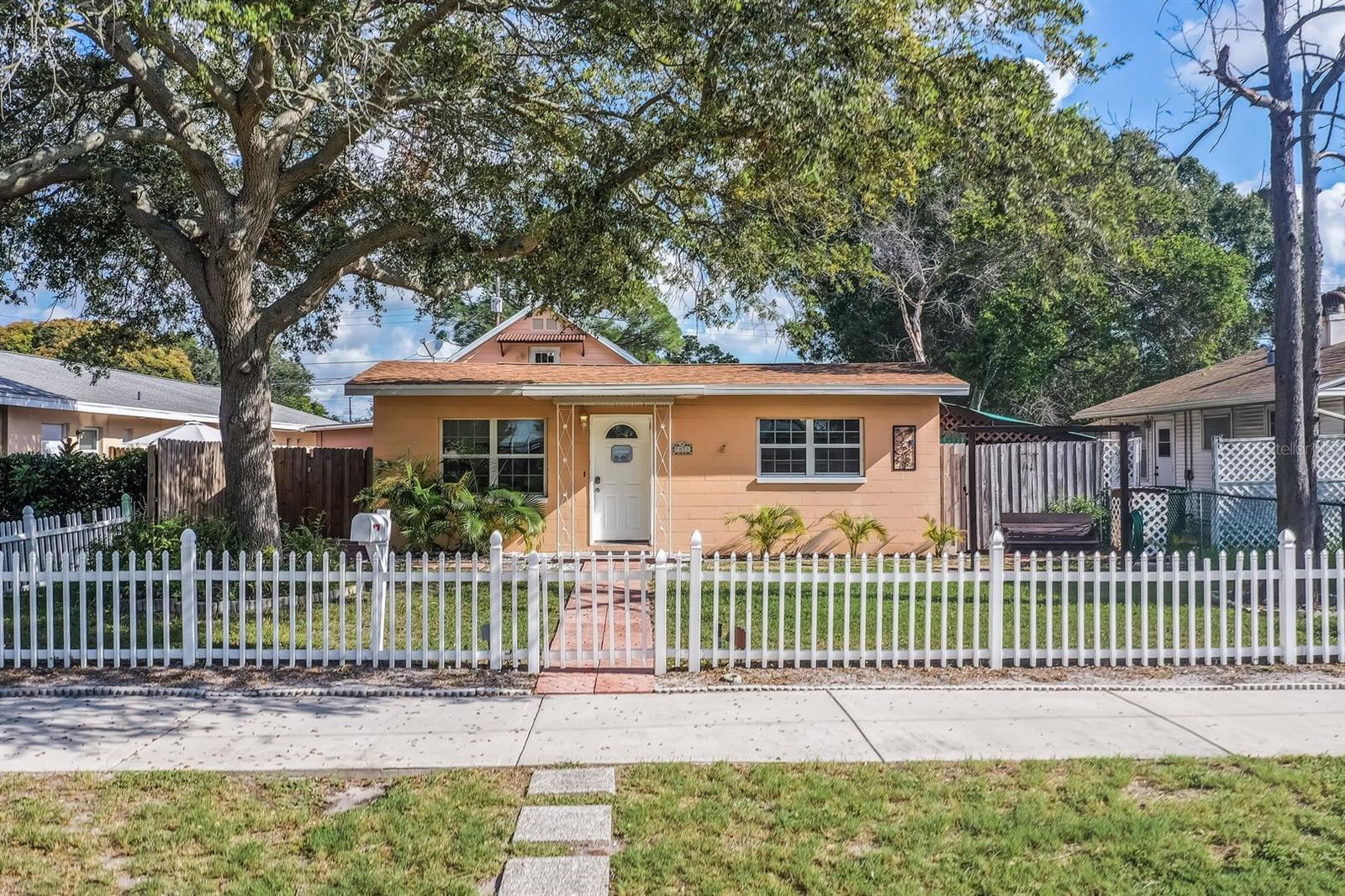 SELLER IS OFFERING $5,000 TOWARDS CLOSING COSTS SELLER MOTIVATED  

This property has a lot to offer!  2 Houses on this lot! Great location and investment potential.  Walking distance to Pinellas Trail & St Pete College, and a short drive to Treasure Island Beach. 
The private fenced in yard offers a lot of space for entertaining that includes a gazebo, a fire pit, and 2 storage sheds. 
Main house has 1,662sqft, built in 1954 with 3 bedrooms & 2 full baths, and a new roof in 2020. Both homes feature ceramic tile in kitchens & bathrooms, and newly installed waterproof vinyl plank flooring throughout. The garage and private driveway is accessible from the alley, as well as the private entrance to guest house. Guest house is a two-story with 1,152sqft, built in 2011 that has a full bath downstairs, 2 bedrooms with a half bath upstairs, and a balcony to relax and enjoy the view.  Great for rental income, or use as mother in-law suite. Located in a non-flood zone.  This property is a rare find and won’t last long.