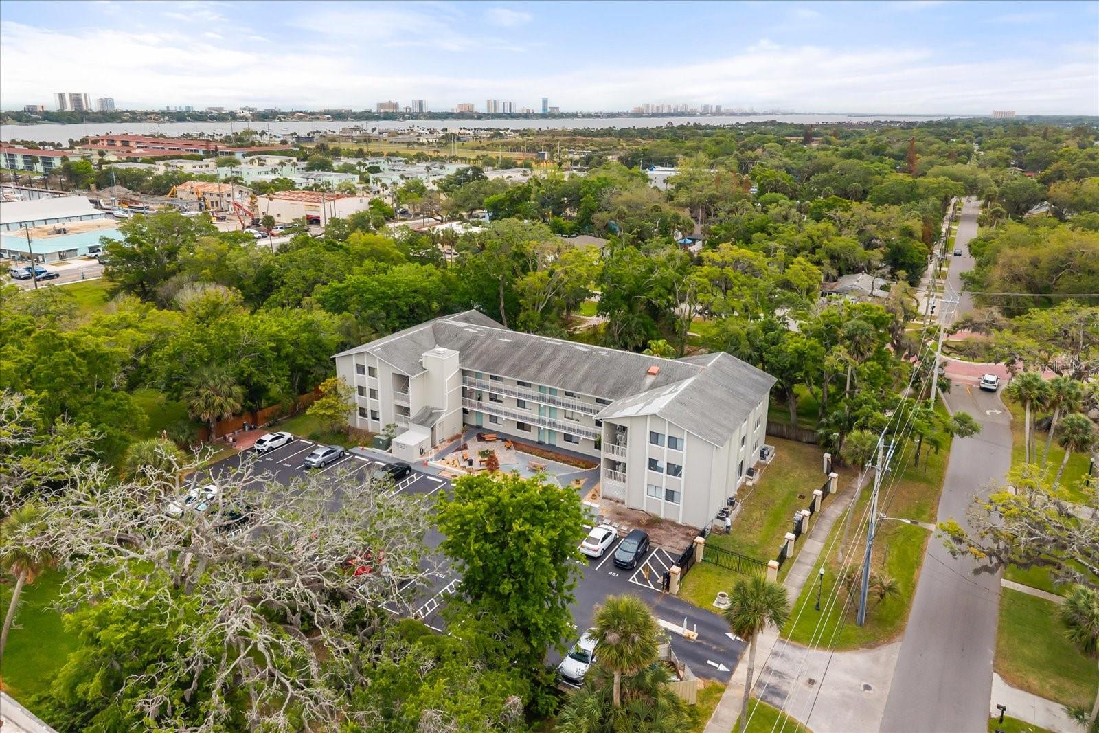 PRICE REDUCTION! MOVE-IN READY CONDO WITH GREAT LOCATION! Welcome to relaxed coastal living in the Harbor Breeze Condominium community. This 1-bedroom, 1-bathroom first floor condo is ideally situated on a quiet street just one block from the Intracoastal and only 2 miles from the sandy shores of Daytona Beach. The interior features tile and laminate flooring throughout—no carpet for easy upkeep. The open-concept layout connects the kitchen and living area, creating a functional and comfortable space. The spacious bedroom offers two closets for ample storage and the bathroom features granite countertops and a full bathtub, perfect for unwinding after a day in the sun. Harbor Breeze is a well-maintained community with fresh exterior paint completed in 2026 and convenient on-site laundry facilities. Pet-friendly! Located walking distance to Halifax Harbor Marina & Yacht Club, nearby parks, and Jackie Robinson Ballpark, or take a short drive to the beach and enjoy the variety of shopping, dining, and entertainment options Daytona Beach has to offer. Conveniently located 10-15 minutes to Daytona International Speedway and Daytona Beach International Airport (DAB). This location makes everyday living easy and enjoyable. Investor friendly; allows for short-term leases of up to 6 months. Submit your offer today!