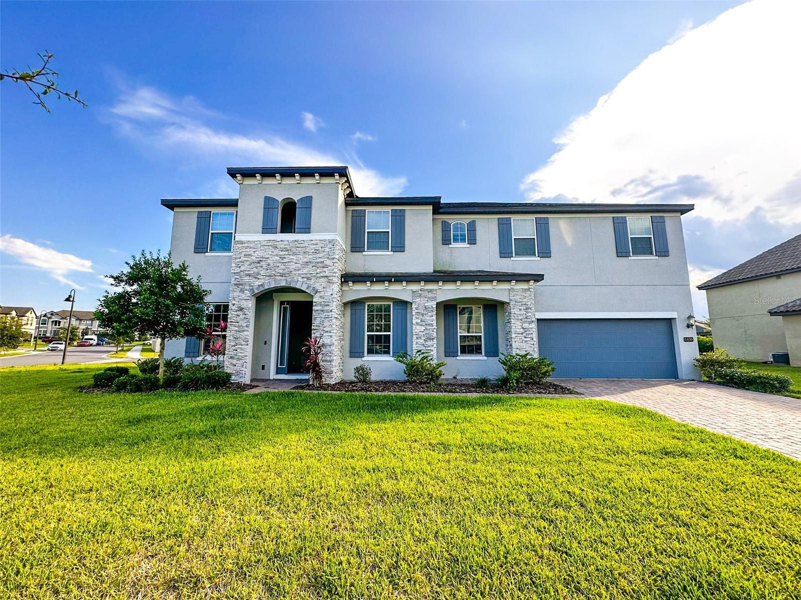 Welcome to this exceptional opportunity to reside in a meticulously maintained 6-bedroom, 4-bathroom, 3-car garage home in the McAllister Landing community, just minutes from the historic charm of Downtown Winter Garden. Situated at the corner of a serene and well-established neighborhood, this residence is surrounded by the captivating allure of majestic oak trees. Upon entry, discover a thoughtfully designed split floor plan featuring a spacious kitchen with a delightful breakfast nook, an elegant formal dining room, and a versatile office/flex space. The lower level encompasses two bedrooms, including a master suite and a guest room, while the upper level boasts four bedrooms, including a second master suite, along with three additional rooms. A generously sized loft adds versatility to the living space. Outside, enjoy a spacious backyard and lanai, perfect for relaxation and outdoor activities, all while enjoying the privacy of no rear neighbors. Additionally, the residence is conveniently located minutes away from the action and entertainment of Historic Downtown Winter Garden and Lake Apopka Wildlife Drive. A short 20-25 minute drive will take you to downtown Orlando, major theme parks, the Mall at Millenia, and Orlando International Airport. Community amenities include a dock on Lake Apopka, walking trails, and landscaped parks, enhancing the overall lifestyle experience.