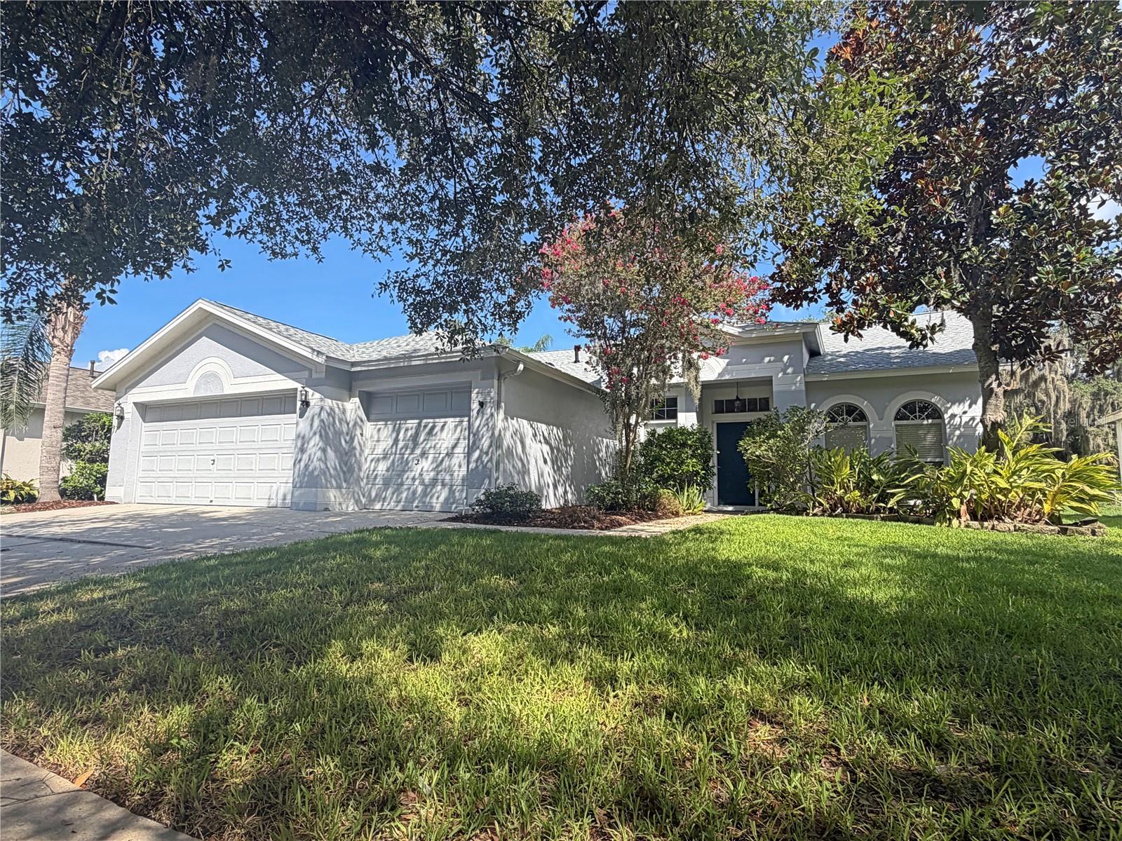 Check out this amazing 4-bedroom, 3-bath pool home with a 3-car garage located in FishHawk Ranch, one of Tampa's premier master-planned communities! Featuring an open split-bedroom floor plan, this home offers vaulted ceilings, a formal dining area, and a spacious kitchen complete with granite countertops, breakfast bar, pantry closet, and separate dining area. Recent updates include fresh interior wall paint throughout and brand-new luxury vinyl plank flooring in the main living areas, giving the home a clean, modern feel.  The master suite features a large walk-in closet, dual vanities, a relaxing garden tub, and a glass-enclosed shower.  Step through the sliding doors to enjoy the large screened pool and patio area overlooking a wooded conservation area with NO REAR NEIGHBORS for added privacy and tranquility. Residents of FishHawk Ranch enjoy access to resort-style community amenities including pools, parks, recreation centers, trails, tennis courts, basketball courts, fitness facilities, and top-rated schools.  Property will be owner managed. Lawn service and pool service are included. **Final cleaning will be completed prior to move in**