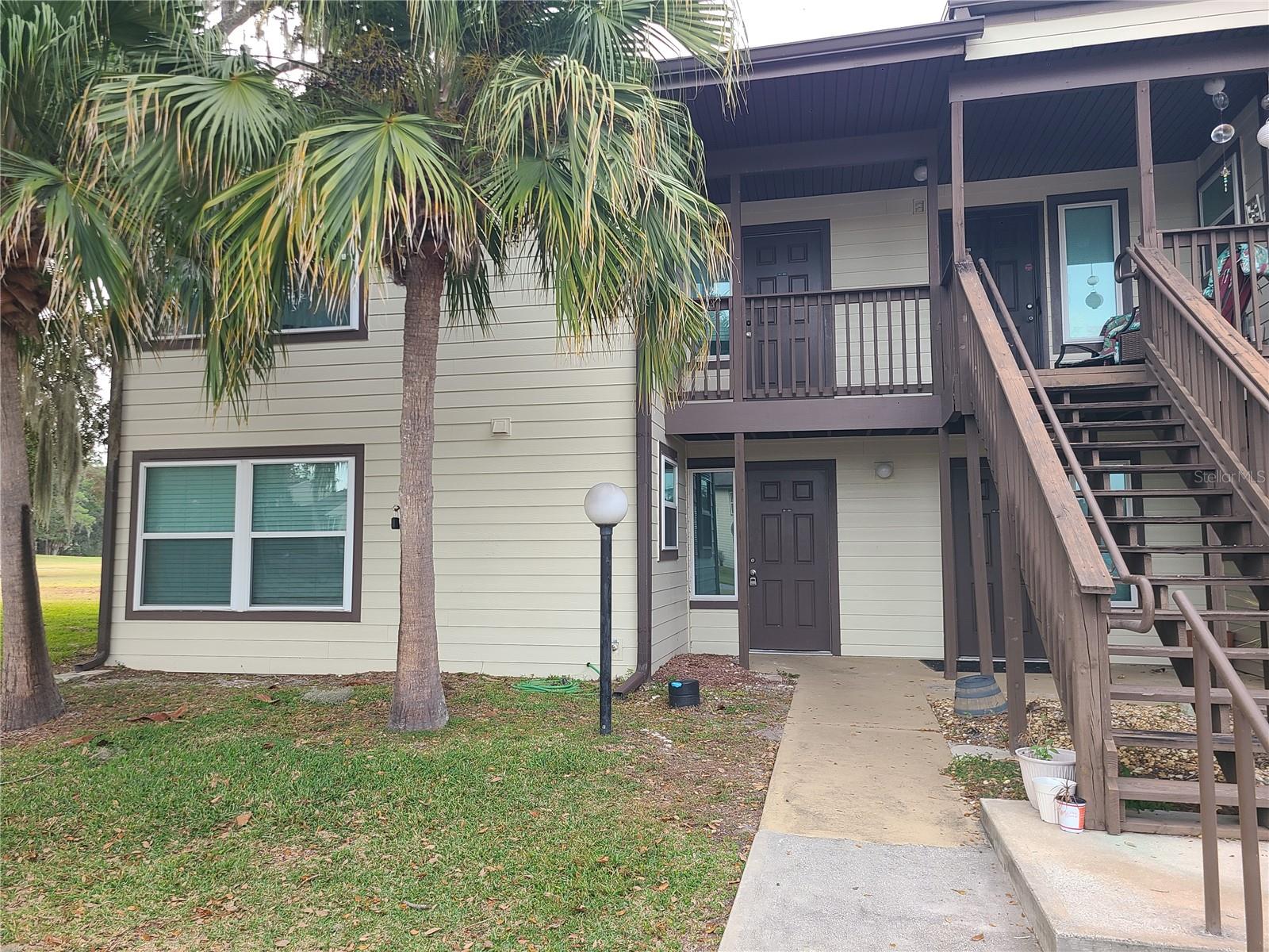 This community just leveled up — BRAND NEW picnic pavilions, pickleball courts, and a basketball half-court now complement the existing pool, and you can be the first to enjoy it all as the owner of this perfect 1 bedroom, 1 bath ground floor condo in the HEART OF WILDWOOD/THE VILLAGES! All tile floors throughout for easy maintenance. Kitchen features granite counters and newer Stainless Steel Appliances. Updated vanity in bathroom. Appliances, HVAC and water heater both within the last 5 years. Good storage space for a condo this size. Bonus flex space off the living room - perfect for an office, den, or enclosed lanai. PRIME LOCATION - down the street from the NOW OPEN Walmart Supercenter featuring Fresh from Florida produce, 2.5 miles to Brownwood Paddock Square, 2.5 miles to Sawgrass Market, and only 5 miles to Eastport, the newest square in The Villages. All of it just minutes away!