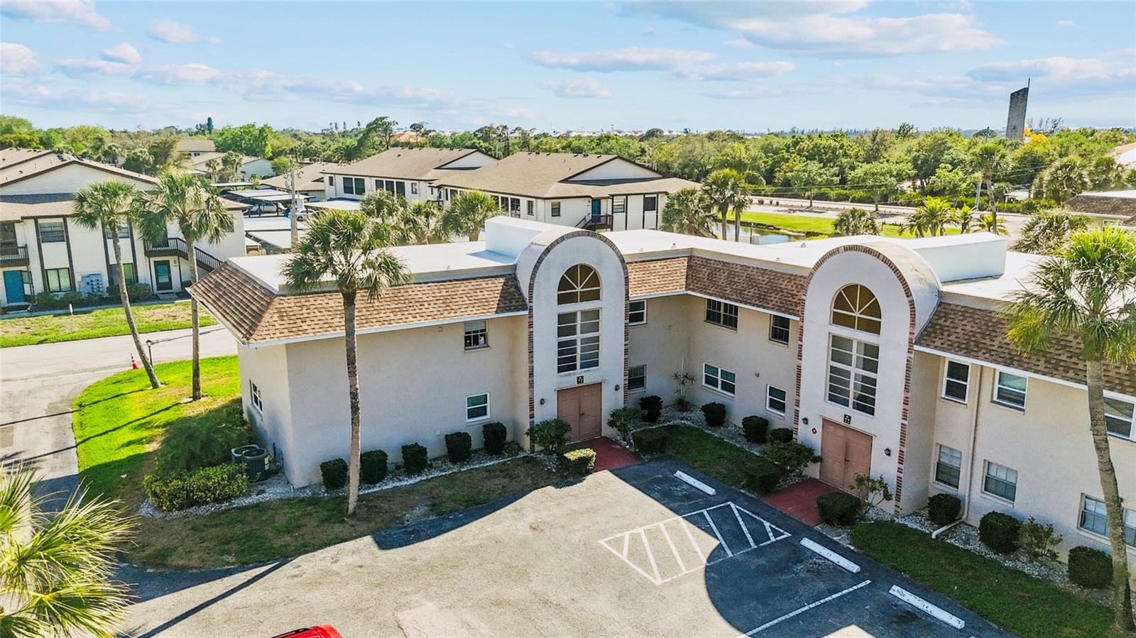 Welcome to easy Florida living in this beautifully maintained ground-floor condo located in a desirable all-ages, pet-friendly community! This inviting home offers both comfort and convenience, making it perfect for full-time residents, seasonal owners, or investors. Step inside to find a bright and functional layout featuring a well-appointed kitchen with stainless steel appliances, ideal for everyday living and entertaining. The primary bedroom features an en-suite bathroom. The ground-floor location provides effortless access—no stairs needed—making coming and going a breeze. Enjoy the best of the Florida lifestyle with a community that offers a sparkling pool and welcoming clubhouse, perfect for relaxing or socializing with neighbors. The location truly can’t be beat—just minutes from beautiful Gulf beaches, scenic parks, shopping centers, popular restaurants, and convenient grocery stores. Whether you're looking for a primary residence or a low-maintenance getaway, this condo combines location, lifestyle, and value all in one.