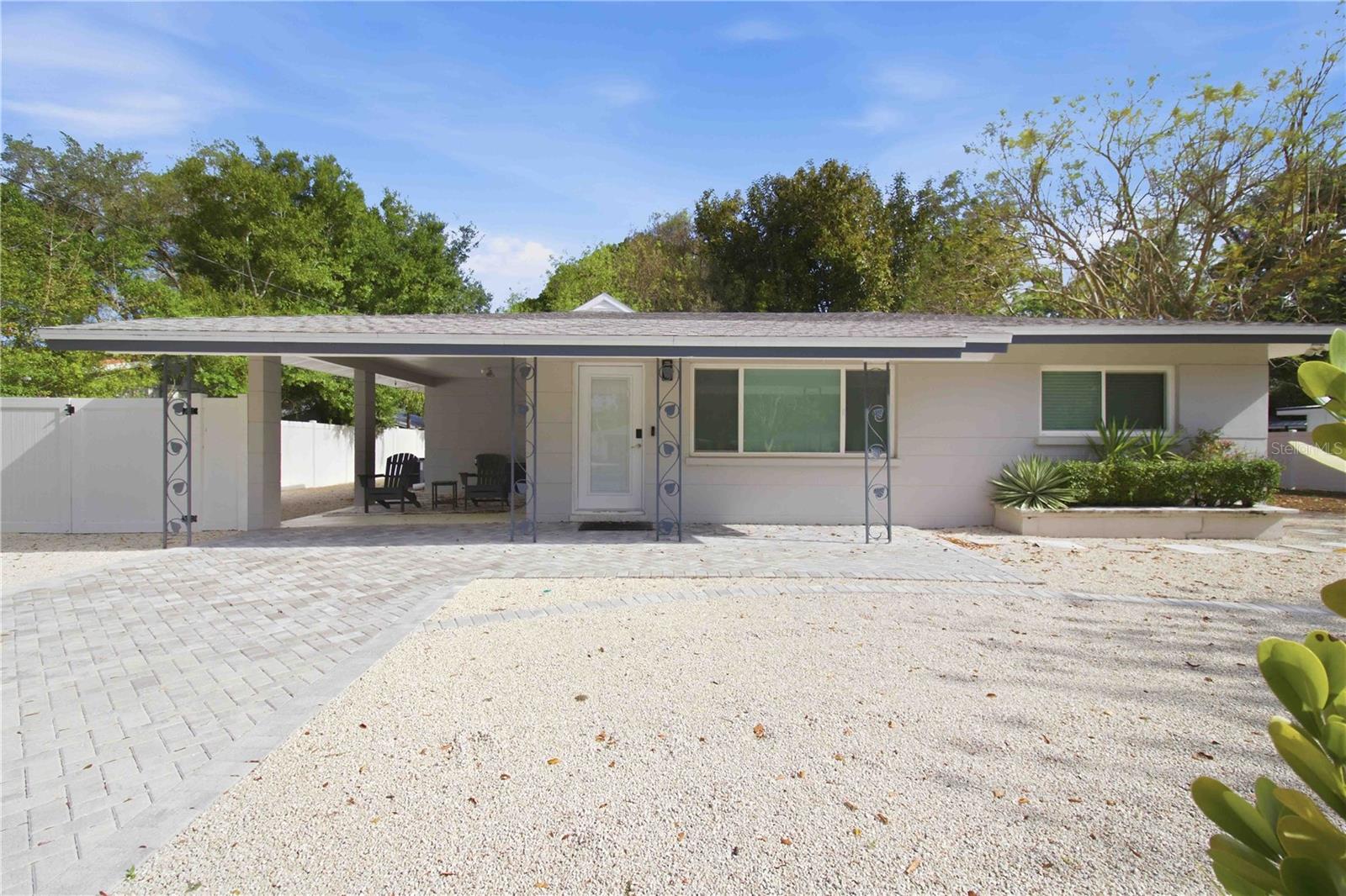 Welcome to this charming home in the conveniently located Alta Vista neighborhood, just minutes from Downtown Sarasota and the best the area has to offer. This move-in ready 3-bedroom, 2-bathroom home sits on a rare double lot on a quiet dead-end street, offering a spacious private backyard with plenty of room to relax, entertain, or expand.

With no deed restrictions, you have the flexibility to make this property your own, including space for boat or RV parking. The fenced backyard provides added privacy and functionality, perfect for outdoor living.

Inside, you’ll find an open split floor plan filled with natural light, creating a warm and inviting atmosphere. The home has been updated with new plumbing, a remodeled kitchen and bathrooms, and easy-maintenance flooring throughout. Additional features include pavers, modern finishes, and functional living spaces designed for comfort and convenience.

The property may be sold furnished, making it a great option for a primary residence, seasonal use, or investment. The double lot also offers future possibilities for expansion or new construction.

Enjoy being just a short walk to the Legacy Trail, along with close proximity to Downtown Sarasota, shopping, dining, and the beautiful beaches, including Siesta Key. Schedule your private showing today!