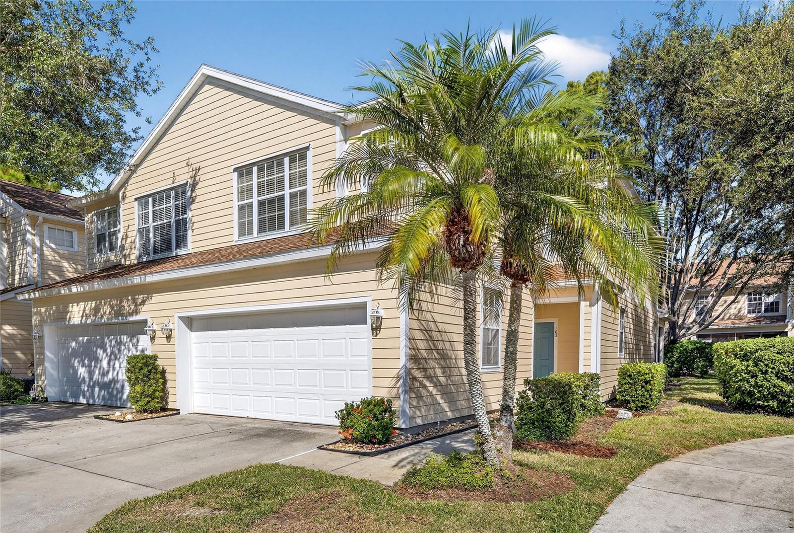 Virtually Staged. Completely updated and move-in ready, this beautifully updated end-unit townhouse offers 1,691 square feet of thoughtfully designed living space in the heart of Lakewood Ranch. With 2 bedrooms, 2.5 bathrooms, a versatile loft and a rare two-car garage, this home delivers a level of space and convenience that’s hard to find in this highly sought-after area. The main level features a bright, open-concept layout where the kitchen, dining, and living spaces flow effortlessly together, ideal for everyday living. New luxury vinyl plank flooring runs throughout, creating a cohesive, modern aesthetic. The kitchen has been tastefully updated with shaker-style cabinetry, quartz countertops, a sleek single-basin stainless steel sink, and a full suite of new stainless steel appliances. A conveniently located half bath on the main floor adds everyday functionality while providing easy access for guests. Upstairs, the spacious primary suite and second bedroom are complemented by a versatile loft, perfect as a home office, fitness space, media lounge, or easily converted into a third bedroom. The secondary bathroom has been refreshed with new flooring, an updated vanity, new lighting, and a new toilet. The primary bathroom offers a spa-inspired feel with updated flooring, dual vanities, and a beautifully tiled walk-in shower. Step outside to your private patio, where mature landscaping and tranquil wooded views create a peaceful outdoor retreat. Ideally situated on a quiet, tree-lined street, this home is just minutes from Braden River Elementary and Middle School, Summerfield Park, and all the amenities of Lakewood Ranch. Enjoy close proximity to Lakewood Ranch Medical Center, UTC’s premier shopping and dining, top-rated golf courses, and an abundance of outdoor recreation. Plus, you’re just a short drive from Sarasota’s vibrant downtown and the area’s renowned Gulf Coast beaches.