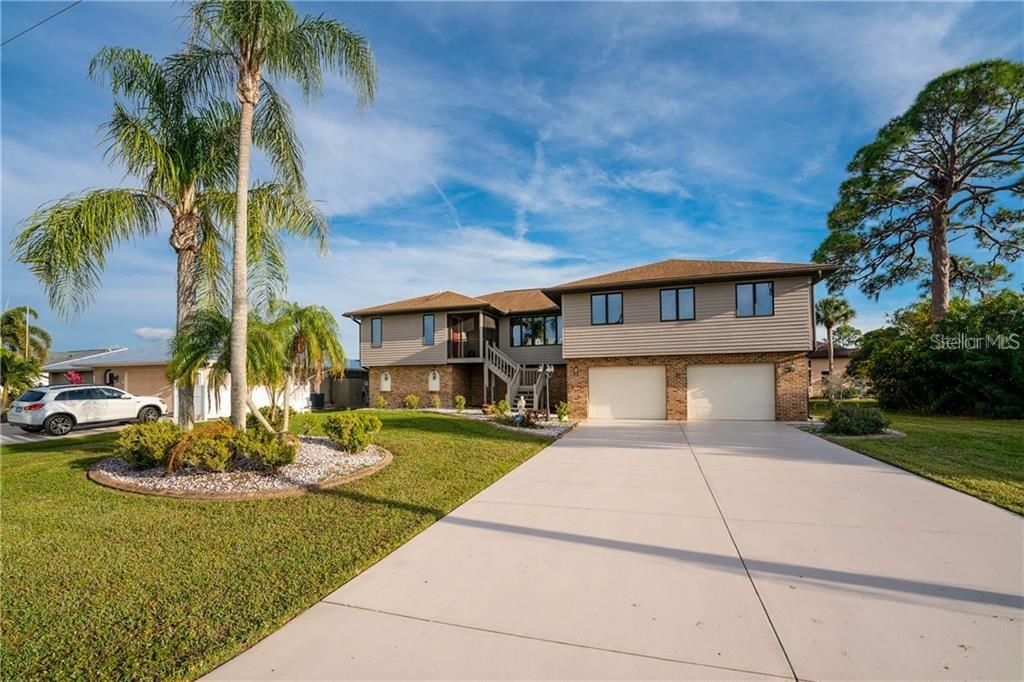 Imagine living in a waterfront home with great location in a quiet neighborhood and only a skip away from the Myakka River. This beautiful custom built home has only been owned by 1 owner and is now ready to be yours. This home features 3 bedrooms and 2 bathrooms with 2,300 SF of living space. As you walk in, you will notice the spacious open floor plan and all the natural light this immaculate home has to offer. The master bedroom has windows with plantation shutters to help keep the sunlight in and out and even a bay window so you can see your pride and joy sitting out on your lift. Enjoy access from your master to your screened in back patio with your own sliding glass door. The master bathroom has dual sinks with a walk-in shower and PLENTY of closet space. The kitchen has wood cabinets with a built in breakfast bar and a kitchen window that looks out to the water. Downstairs is the garage area that has poured concrete walls which is what makes this home solid. The owner said they have been to able to comfortably fit 4-5 cars inside their garage before. Start your own little car museum underneath your home or have plenty of space for a workshop/storage area. There's 1 bridge to go under to get to the Charlotte Harbor from the Myakka River which is the 776 EL Jobean bridge. There's nothing better than a straight shot from your home by boat. Give this home your own loving touch and you will fall in love with Florida even more. PUBLIC WATER and SEPTIC TANK. HOA IS OPTIONAL! Only 20 minutes from Englewood beach and Boca Grande! Enjoy all the nearby golf courses and restaurants/shops/sunsets this beautiful town has to offer. This home is priced to sell, schedule a private showing now before it's too late!