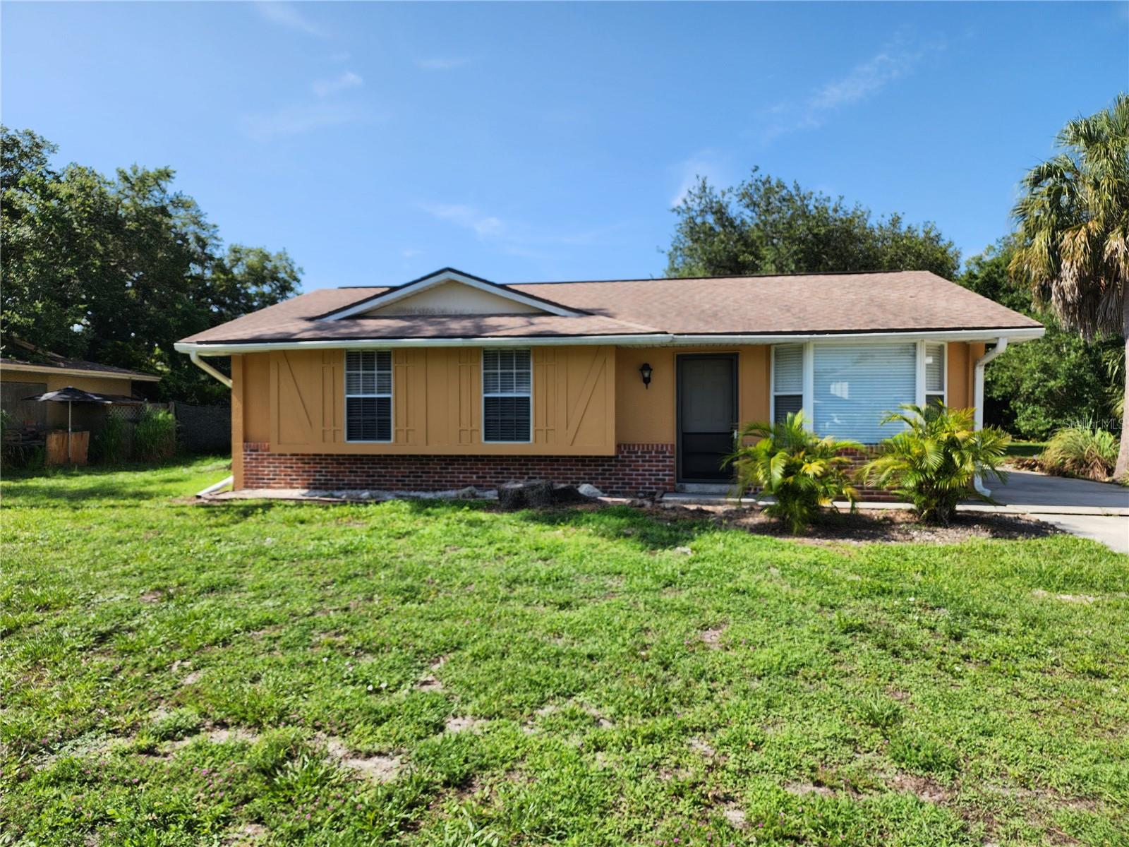 3 Bedroom 2 bath home featuring tile throughout, nice size living room, kitchen opens to dining room with sliders to large lanai, primary bedroom with private bath and slider to the lanai, roof 2021 just minutes to parks, shopping, restaurants, churches and schools