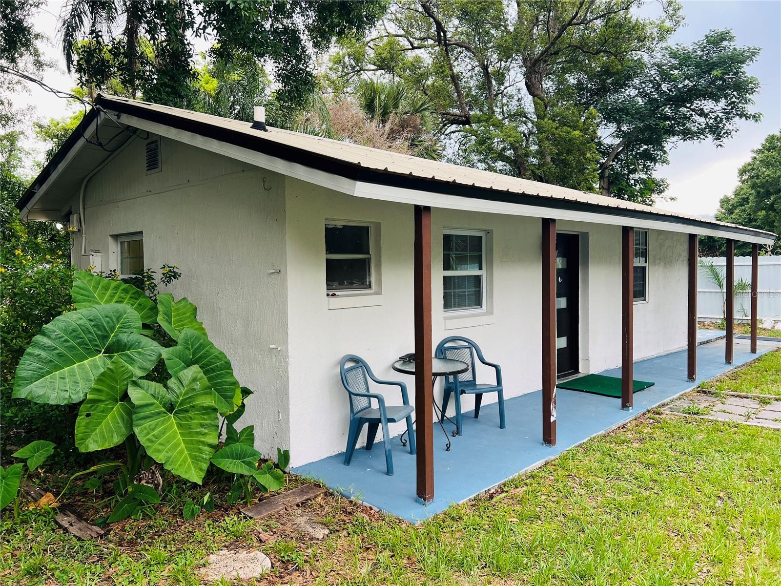 Located on a sprawling 0.37-acre lot, the largest of its kind, this beautifully renovated 1-bedroom, 1-bathroom property features laminate flooring, an open-concept layout, white cabinetry, and stainless steel appliances. It offers a unique combination of comfort and great potential for increased income. You can build a second home and use the existing one as a guest house. The ample lot provides plenty of space for RVs and boats, and there's plenty of parking. No HOA fees. Just minutes from downtown Orlando (8 miles), Orlando International Airport (13 miles), and Universal Studios (24 miles), this is a lifestyle investment in one of Orlando's most desirable areas. Don't miss this incredible opportunity!