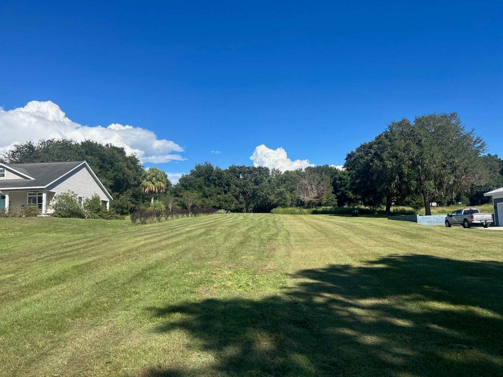 NO IMPACT FEES! They have already been paid and with a well already on site and underground utilities already in place, you’ll save a lot of money and have a head start on building the dream home you’ve always imagined. Lake View Living Awaits! Discover 1.98 stunning acres overlooking Lake Weir! Perched on a high elevation, this property offers serene views of the lake and is graced with majestic granddaddy oaks for natural beauty and shade.  Don’t miss this rare opportunity to own a piece of paradise near the water!
