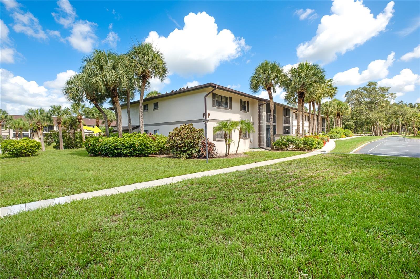 Move in Ready Ground Floor Condo in Oak Forrest located in a 55+ community. Enjoy the Peace and Security of a Gated neighborhood that is just off US-41 and located in a X500 Flood Zone. The condo features a spacious layout and a private screened lanai with peaceful views. Updates include HOT WATER HEATER 2026, UPDATED ELECTRICAL PANEL 2026, STAINLESS STEEL KITCHEN APPLIANCES, KITCHEN SINK and KITCHEN COUNTERTOPS 2026, LIVING ROOM & BEDROOM CEILING FANS 2026, DINING ROOM LIGHT 2026, NEW WINDOW & SLIDER BLINDS with NEW LUXURY VINYL PLANK FLOORS in the bedrooms. The $357 MONTHLY HOA fee INCLUDES Water, Sewer, and Trash. Oak Forrest offers three HEATED Swimming Pools, a spacious CLUBHOUSE, BBQ Area, and Shuffleboard Courts, as well as a Sun Deck and Recreation Area. Scenic sidewalks throughout the neighborhood provide the perfect setting for peaceful morning and evening walks. Oak Forrest is a pet-free community conveniently located close to the Port Charlotte Library, popular social clubs such as the Moose, Legion, and Elks and minutes from Shopping, Dining, & Medical Facilities. Just a short drive away you will find Gulf Beaches, Golf Courses, Sunseekers Resort, Spring Training Facilities along with 3 main airports (Punta Gorda, Fort Myers, and Sarasota). Whether you're downsizing, escaping the winter, or looking for an affordable place to call home, this move-in-ready condo is waiting for you. Schedule your private showing today!