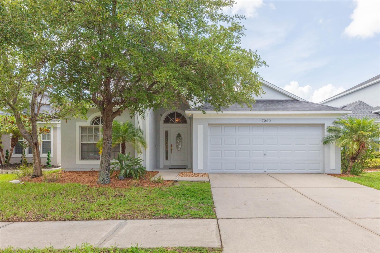 Welcome to the well-established community of Oak Creek! This 3 bedroom plus office, 2 bath home boasts a bright and open floorplan with architecture details throughout! Upgrades include: Interior paint (2026), NEW ROOF (2025), exterior paint (2025), Generator transfer switch installed (2025), LVP flooring (2021), Water heater (2021), and A/C (2018). Entering into the foyer, double doors lead into the den, ideal for a private home office or flex space. The kitchen features granite countertops, complementary backsplash, pantry closet, and breakfast bar that opens the living room. The formal dining room and breakfast nook allow for plenty of seating when entertaining family and friends. Glass sliders lead out onto the screened lanai overlooking the spacious backyard with endless possibilities to fit your lifestyle. Back inside, the primary bedroom boasts a large walk-in closet and ensuite with granite countertop vanity with dual sinks, glass shower and separate soaking tub. Both secondary bedrooms are ample in size and share the remaining full bath. Oak Creek's low annual HOA fee of $299 includes wonderful amenities like a resort-style pool with jacuzzi, clubhouse, park, dog park, playground, basketball court, and soccer field. Located in the heart of Riverview, there is close proximity to schools, shopping, dining, I-75, US-301, and the Selmon Expressway for easy commuting into downtown Tampa, Tampa International Airport and MacDill Airforce Base.