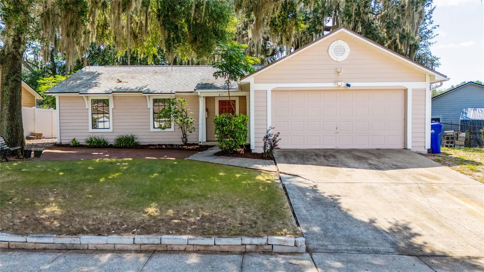 Beautifully renovated and move-in ready! Welcome to this stunning home in the highly sought-after Forest Oaks community of Ocoee—an established, family-friendly neighborhood with NO HOA. Situated on a spacious corner lot, this home has been thoughtfully updated with modern finishes throughout.

Step inside to discover brand-new luxury vinyl plank flooring in all three bedrooms, ceramic tile throughout the main living areas, and fresh interior and exterior paint that gives the home a clean, contemporary feel. The kitchen has been refreshed to preserved the original character of the home. This includes freshly painted cabinetry and updated hardware that complement the new fixtures. The original countertops have been maintained. The guest bathroom include new vanity and light fixtures. The master bathroom has the original vanity but shower has been fully gutted and replaced.

Major updates provide added peace of mind, including a new roof (2022), A/C (2015), and a newer water heater. The screened-in back patio overlooks a large, fenced backyard, creating the perfect space for outdoor entertaining, relaxing, or pets to enjoy.

Ideally located just 2.2 miles from Prairie Lake Elementary, 4.5 miles from Ocoee Middle School, and 5 miles from Ocoee High School, this home also offers convenient access to shopping, dining, parks, and major highways. Combining modern updates, an excellent location, and no HOA, this exceptional property is ready to welcome its new owner.