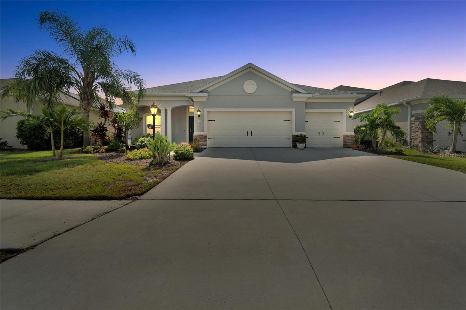 This gorgeous POOL home in the gated community of Rivers Reach is a MUST HAVE! This home features over 9’ ceilings and a large open floor plan. As you enter through the foyer, you’ll find a separate den/formal living area AND a formal dining space. The Great Room features a coffered, tray ceiling and a pocketing 4 panel sliding glass door leading out to your own pool/spa Oasis area! Other features include crown molding in some rooms, plank tile flooring, upgraded appliances, 42” tall kitchen cabinets and a closet pantry. The master suite features 2 walk- in closets and a beautiful master bath with dual sinks in taller vanities along with a fully tiled walk-in shower. You also have an additional Den/Office at the back of this home with a ½ bath that includes a door leading out to the pool area. Leaving the kitchen, you come to the laundry room and 2 guest rooms that share a full 2nd bathroom. This home has a 3-car garage with storage shelves and ladder access to a partially floored attic. And now for the Coup de grace: YOUR very own beautiful, screen enclosed saltwater HEATED POOL with a sun shelf and hot tub for relaxing, surrounded by a large deck area that is partially under cover. The pool and yard include beautiful Bluetooth controlled lighting for nighttime enjoyment. All pool functions are Wi-Fi controlled for ease of use. Upgrades to this home include a fully fenced back yard, irrigation misting system, Culligan water softener, UV light in AC, 7 ceiling fans, tinted rear glass and extra shelving in closets and garage. 
The River Reach community is a place where you can relax and enjoy tranquil nature preserves, walking trails, a kayak/canoe launch in the Manatee River, a community pool/spa area, playground and beautiful landscaping.