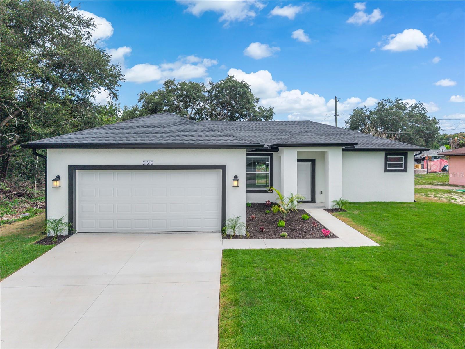 Gorgeous Brand new Single Family home ready to move-in! Enjoy life with this exceptional new construction ready to make your dreams come true "NO HOA or CDD fee"! 3 Bed / 2 Full Bath. Upon walking into the home you are greeted with a beautiful floorplan with sliding glass doors overlooking the Backyard, the kitchen is fully with quartz countertops, stainless steel appliances, wood accent walls, wood crown molding, luxury lighting ,42'' solid wood cabinets ,Complemented by impact-resistant windows and luxury vinyl flooring all over the house, luxury porcelain title wall and floor on bathrooms, private mailbox, High Ceilings, all energy efficient LED lights and fixtures; with a large driveway leading to a two-car garage. This neighborhood is close to Us-27 highway , has access to major expressways as I-4, restaurants, shopping and parks. Schedule a showing Today and Take advantage before it is gone!!!