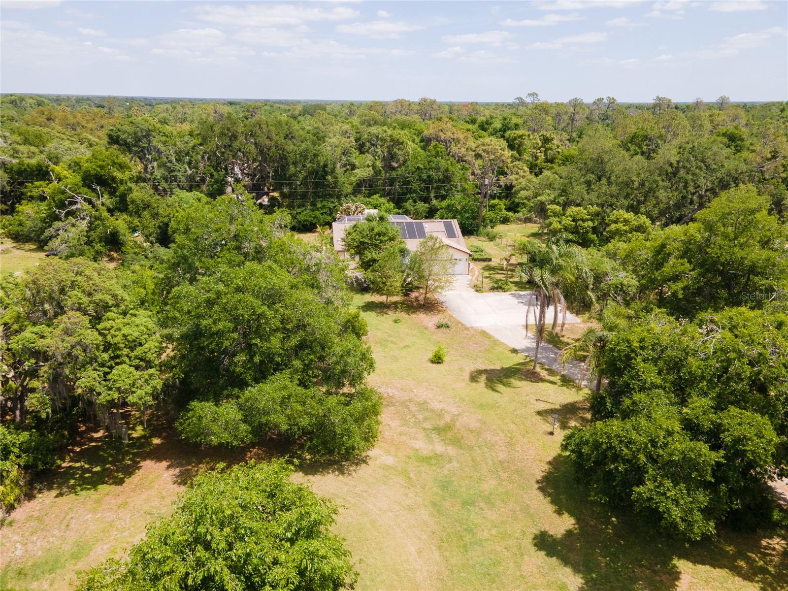 Agricultural Property in the Growing Parrish Corridor – Direct Access to Major Throughways

Strategically located in the expanding Parrish, Florida corridor, this 1+ acre agricultural property offers immediate income potential with long-term upside. Positioned with direct roadway access to U.S. Route 301 and Fort Hamer Road, the property benefits from strong connectivity—enhancing its appeal for residential living, rental income, or potential future business operations.

The property includes a 3-bedroom, 2-bath single-family home featuring a private saltwater, solar-heated pool, presenting an opportunity for stable long-term rental income or premium short-term leasing in a high-demand growth corridor.

Located within one of Manatee County’s fastest-growing areas, this parcel represents a strategic acquisition for developers and land investors seeking to capitalize on expansion trends. Surrounded by ongoing residential and commercial development, the site benefits from increasing traffic exposure, infrastructure investment, and rising land demand. With strong frontage and accessibility, the property is well-positioned for future appreciation and potential repositioning, making it an ideal candidate for land banking, redevelopment, or higher-density use (subject to zoning approval).

Opportunities like this are becoming increasingly limited in the Parrish, Florida growth corridor—secure a position ahead of continued development and rising land values. Acquire now, generate income in the short term, and capitalize on the area’s transformation as demand accelerates.

Important Note:
One or more photos have been virtually staged and/or items may have been removed from interior and/or exterior images.

For additional details or to schedule a showing, please contact the Listing Broker