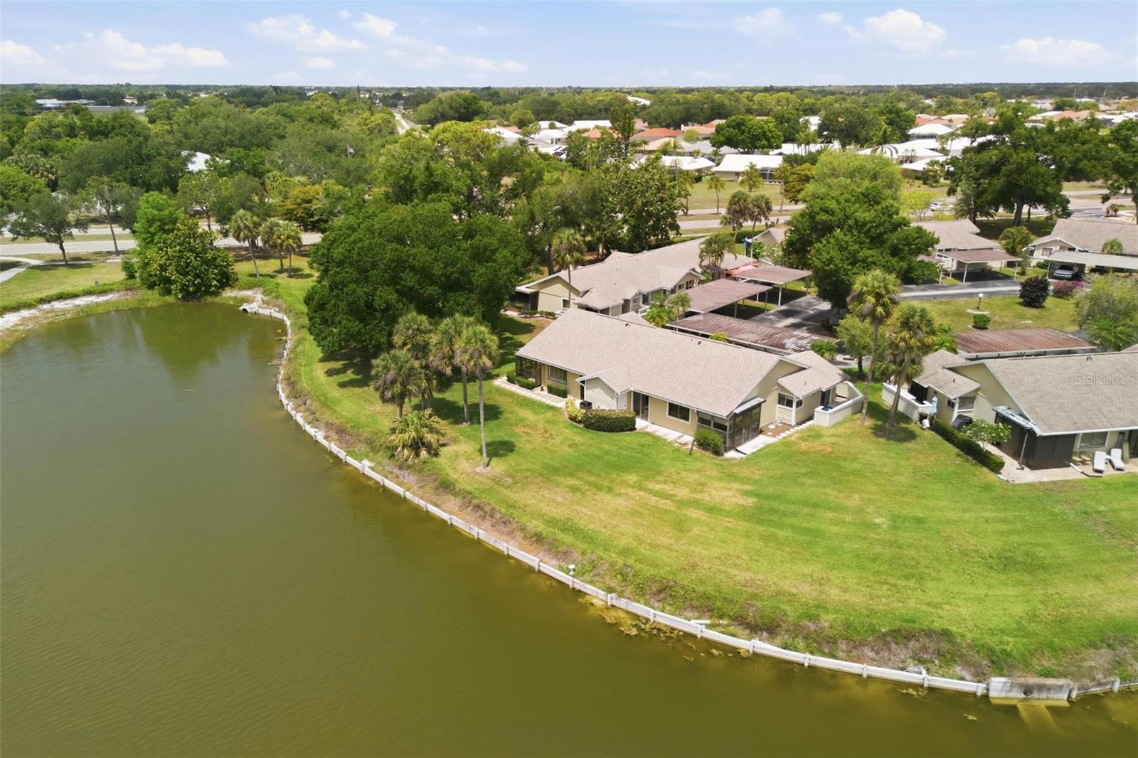 Lovely 3-bedroom, 2-bath corner villa with tiled floors throughout and a covered carport for two vehicles, offering peaceful lake views in Heron Lakes — a charming community of only 35 villas open to all ages. Sold turnkey furnished, just bring your personal belongings and start enjoying the Florida lifestyle.

Centrally located in Venice near shopping, restaurants, and medical facilities, this home offers a split-bedroom floor plan perfect for family and guests, vaulted ceilings, inside laundry, a newer A/C unit, hurricane shutters, and a lovely screened-in lanai where you can enjoy your morning coffee or evening cocktails overlooking the serene private backyard setting.

The beautiful Gulf beaches and historic downtown Venice are just a short drive away, while the East Village Center is within walking distance and offers a community pool, tennis and pickleball courts, clubhouse, fitness center, and library.

Monthly fees include roof maintenance, exterior maintenance, exterior pest control, and landscaping.

A must-see property waiting for you!