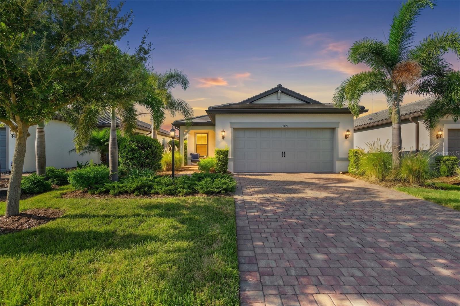 Welcome to 17726 Northwood Place in the highly sought-after Del Webb at Lakewood Ranch, one of the area's premier 55+ resort-style communities. This beautifully appointed Pulte Contour model offers 1,405 square feet of thoughtfully designed living space with 2 bedrooms, 2 bathrooms, a versatile den/flex room, and a 2-car garage.  Offered fully furnished, (minus artwork) this move-in-ready home makes it easy to start enjoying the Florida lifestyle from day one. The open-concept floor plan is filled with natural light and flows seamlessly to the covered lanai, where you'll enjoy peaceful water views, the perfect setting for morning coffee or evening relaxation.
Designed for low-maintenance living, this home combines comfort, functionality, and style in one of Lakewood Ranch's most desirable active adult communities. Residents enjoy world-class amenities, including a resort-style pool and spa, fitness center, pickleball and tennis courts, clubhouse, social clubs, walking trails, and a full calendar of activities. Conveniently located near shopping, dining, golf, medical facilities, and the area's renowned Gulf Coast beaches, this home offers the ideal blend of luxury and lifestyle.
Whether you're looking for a seasonal retreat or your full-time Florida home, this exceptional furnished property is ready for you to move in and start enjoying everything Del Webb and Lakewood Ranch have to offer.